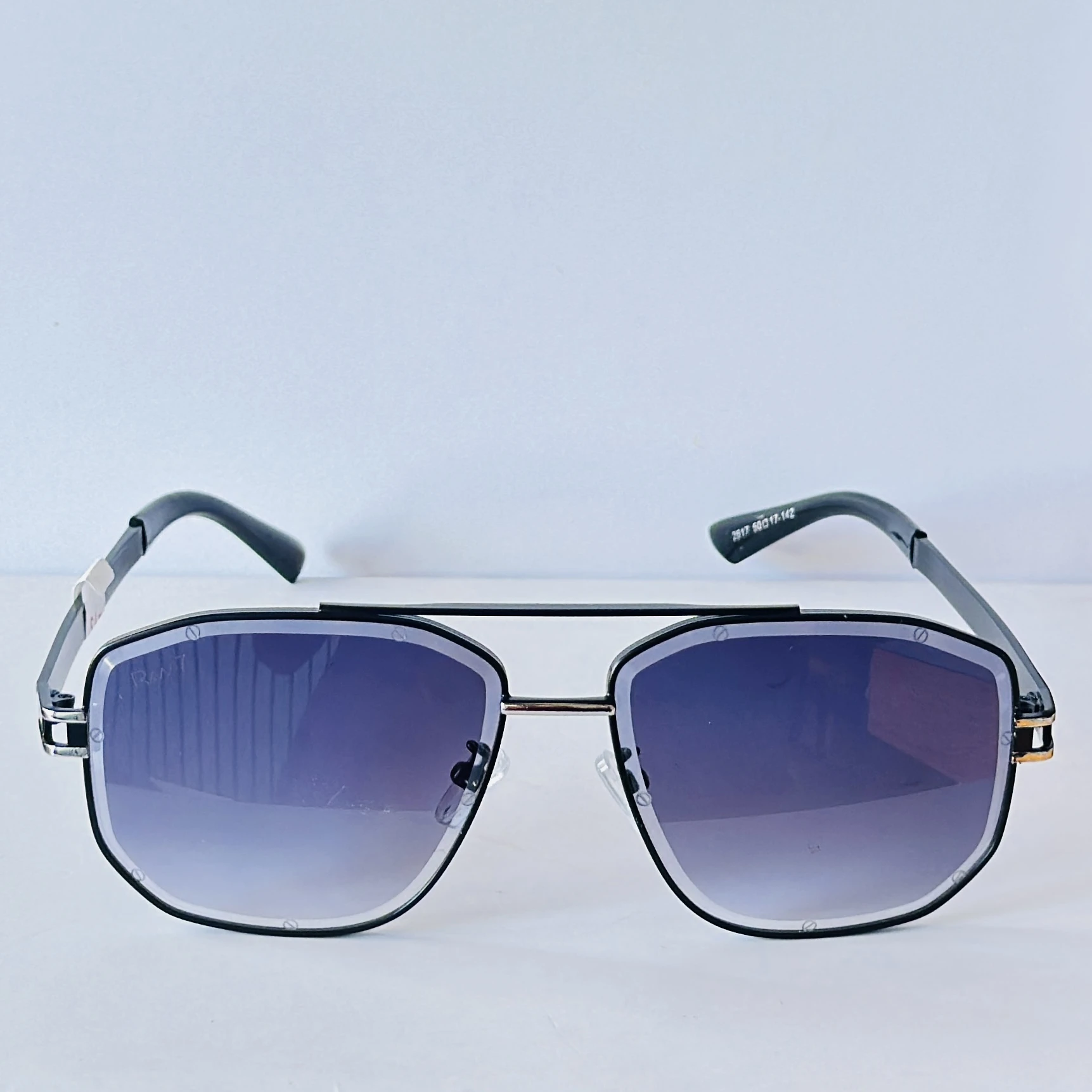 pair of Raw 7 branded men's rectangular sunglasses