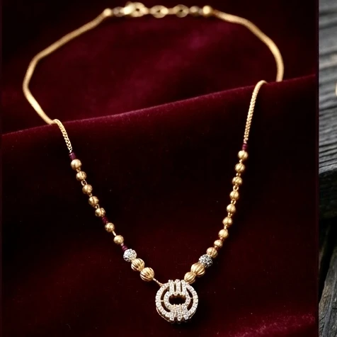 alloy necklace features a circular cubic zirconia pendant