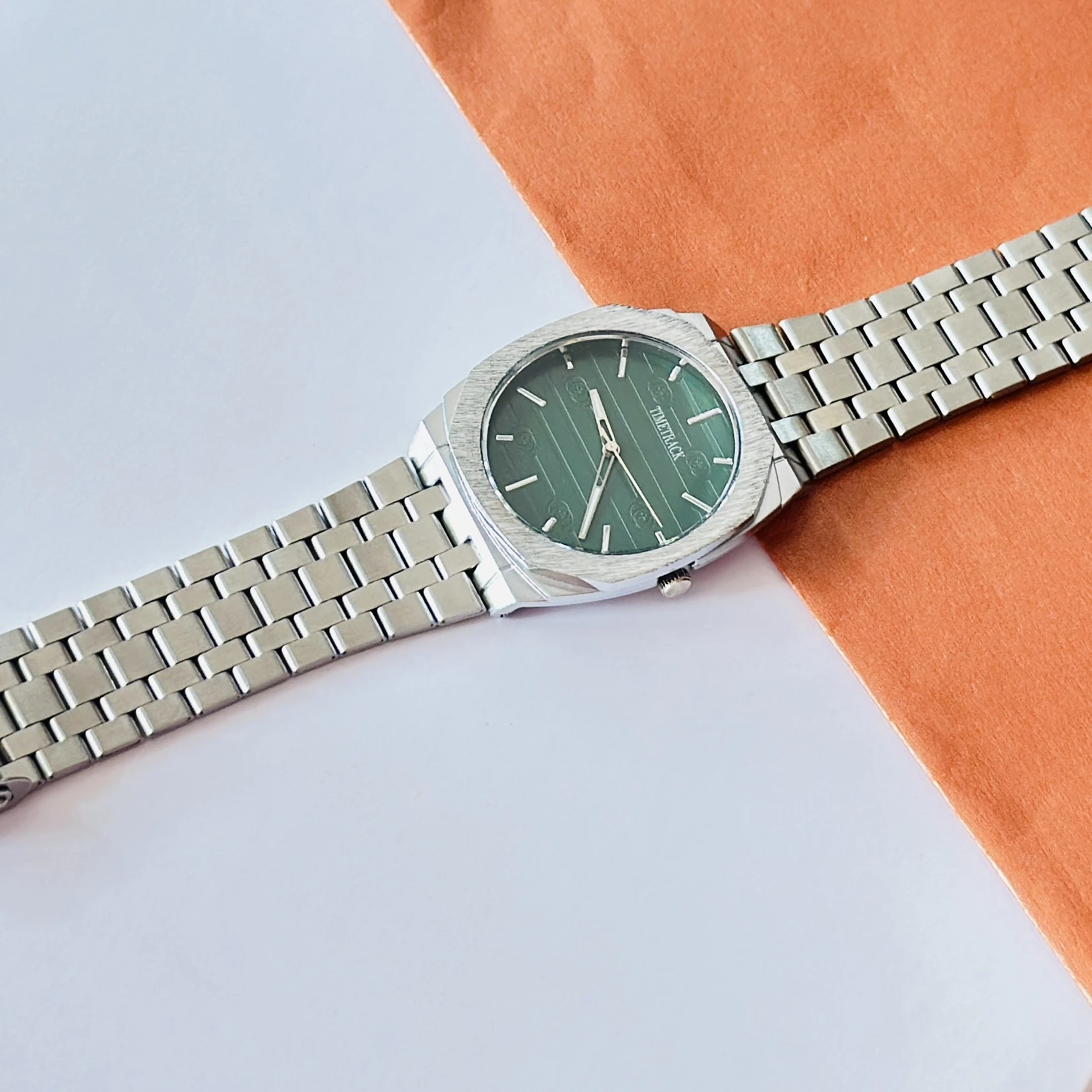 silver-toned stainless steel analogue watch