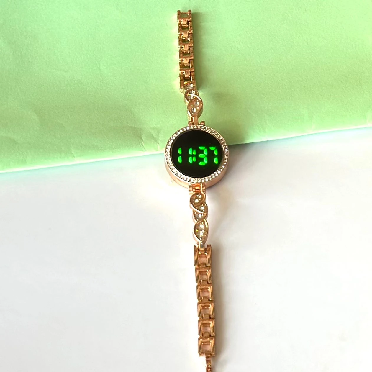 generic diamond-studded LED touch screen digital watch.