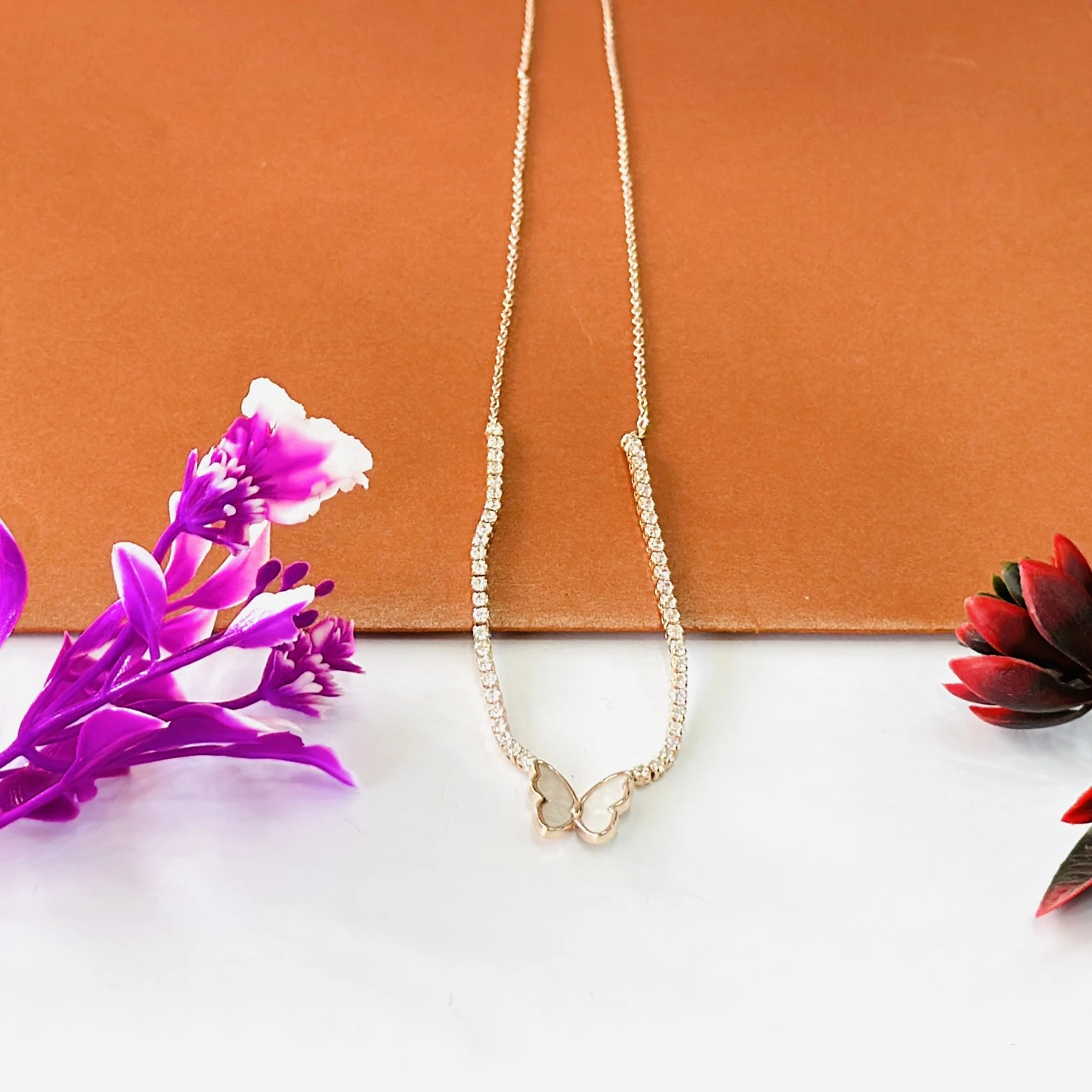 Gold tone butterfly pendant