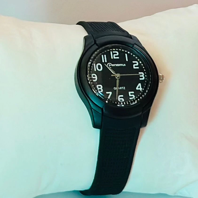 Edillas Kids Analog Watch with a mint green silicone strap.