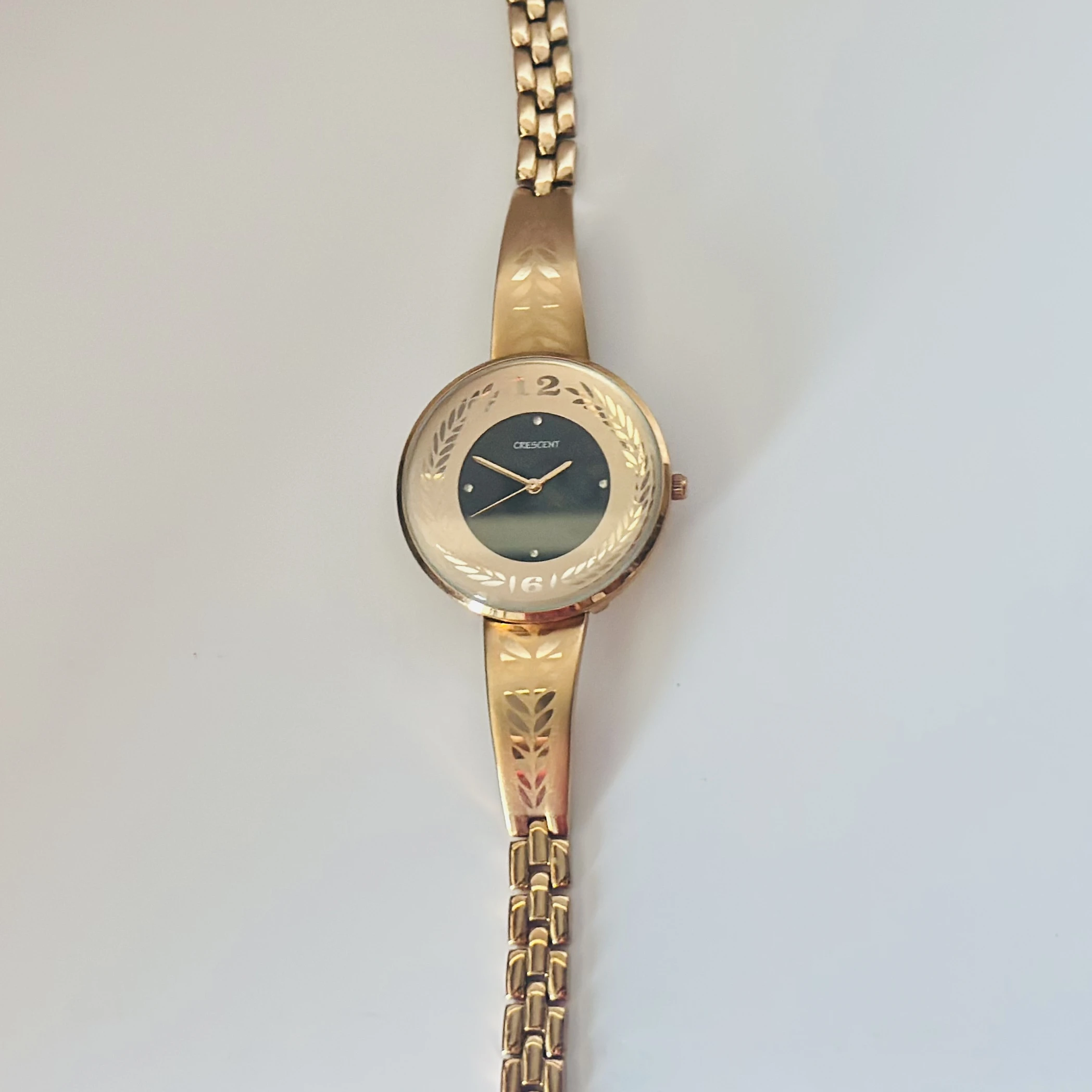 Montres Carlo women's gold-toned analog watch