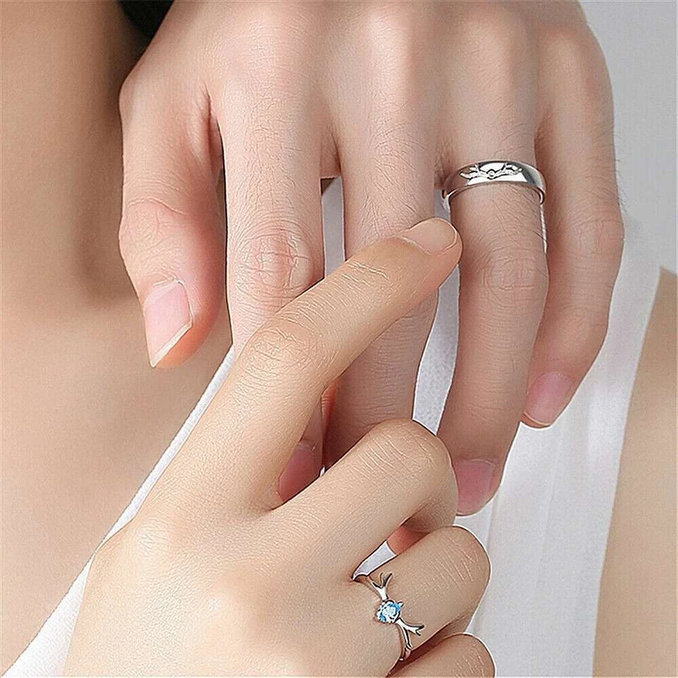 Set of adjustable, silver-plated couple's rings
