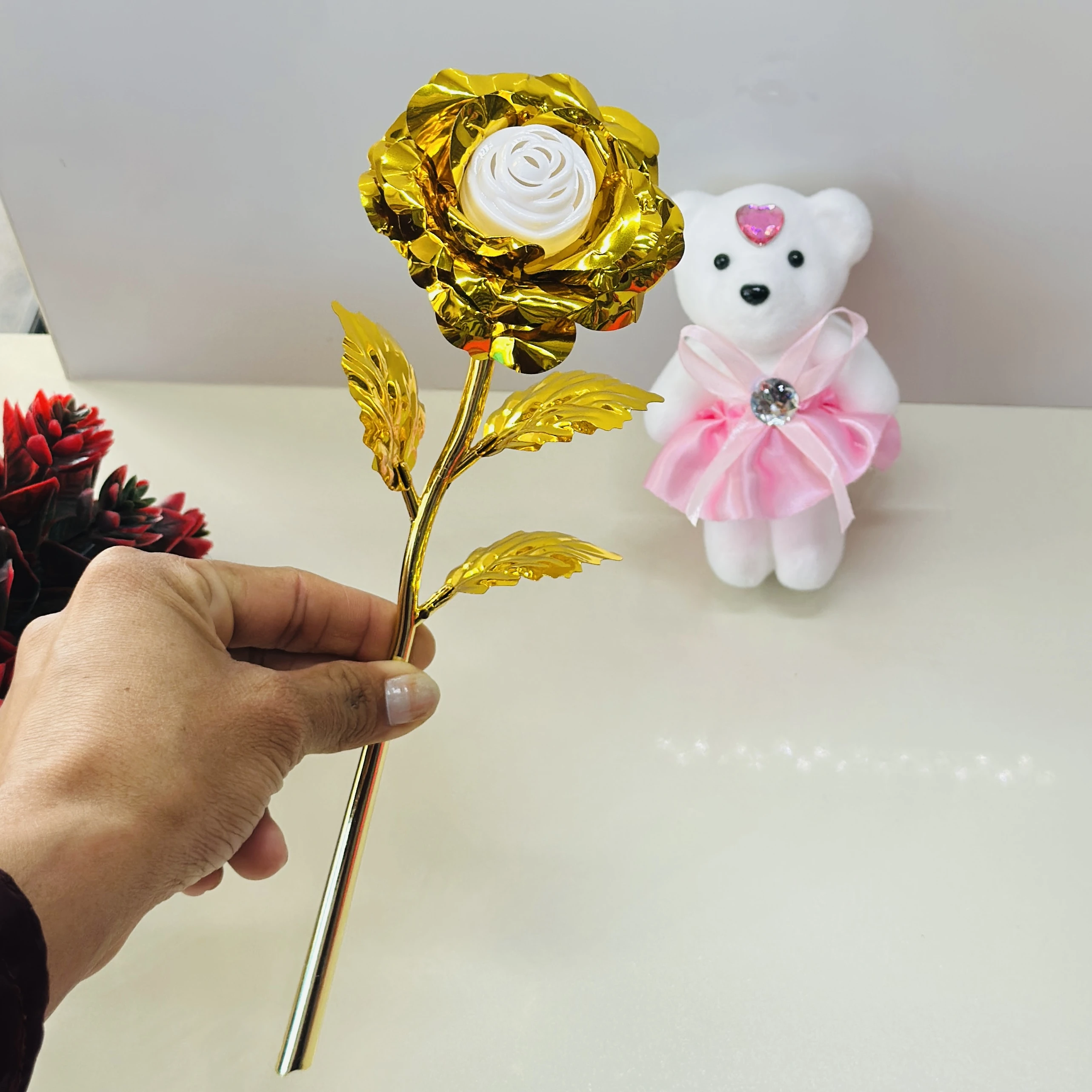 Golden rose and a small teddy bear gift set