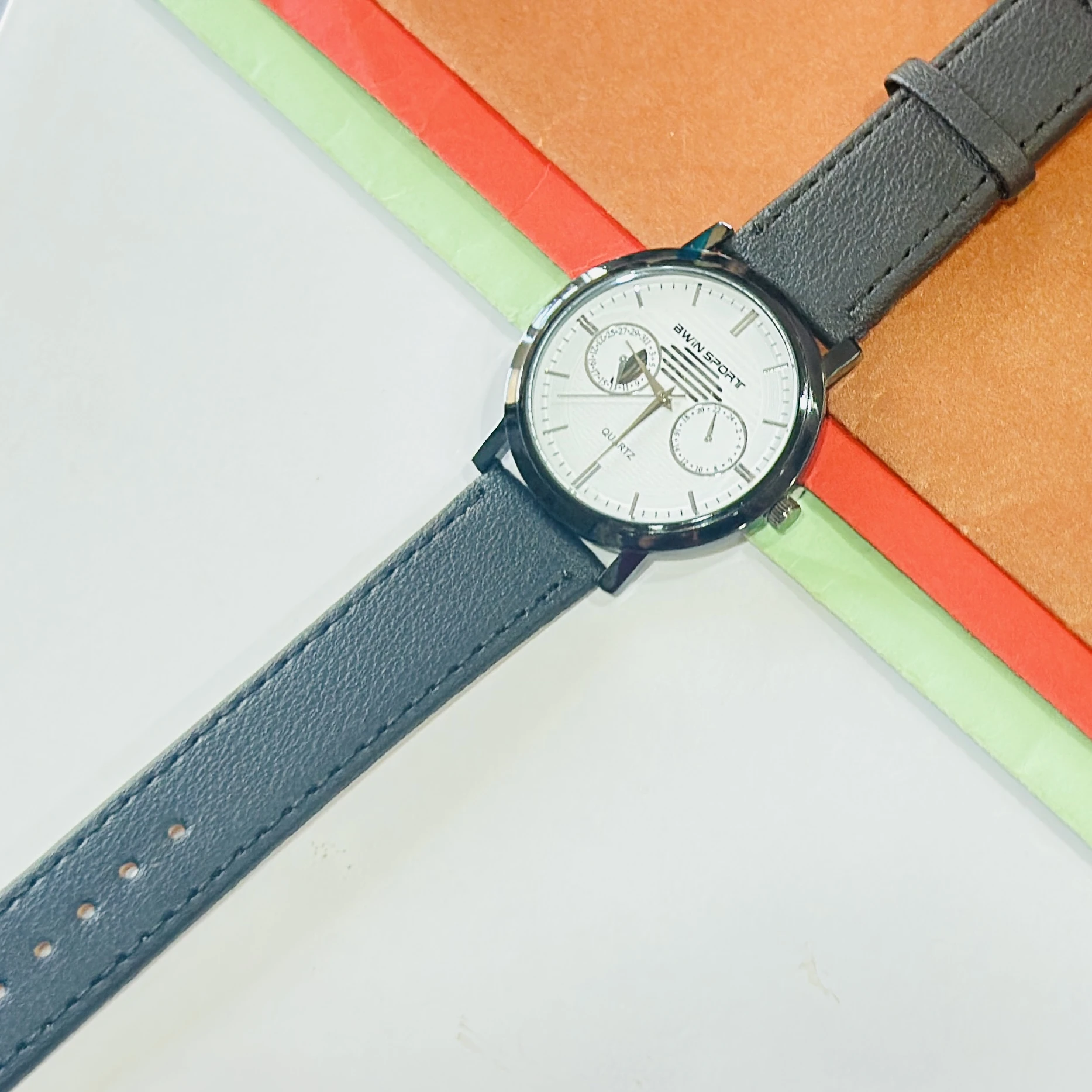 watch is a BWIN brand analog watch