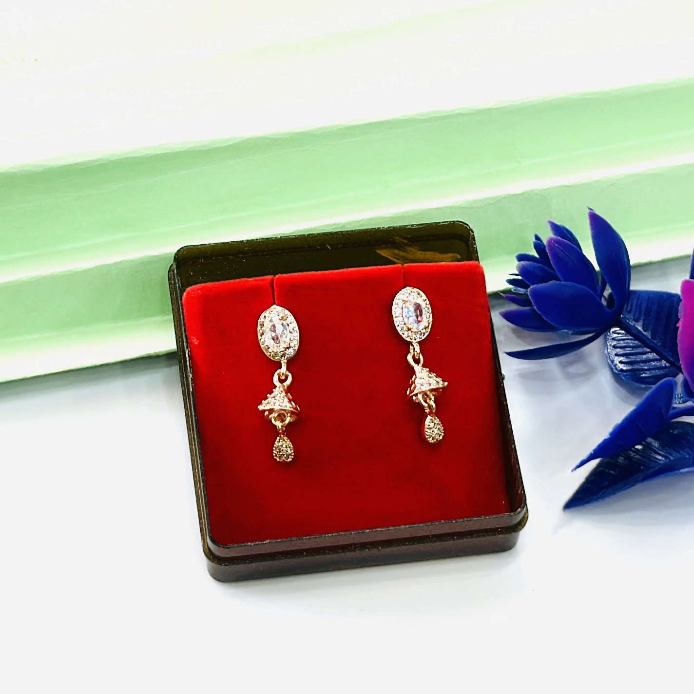 Gold toned jhumka earrings