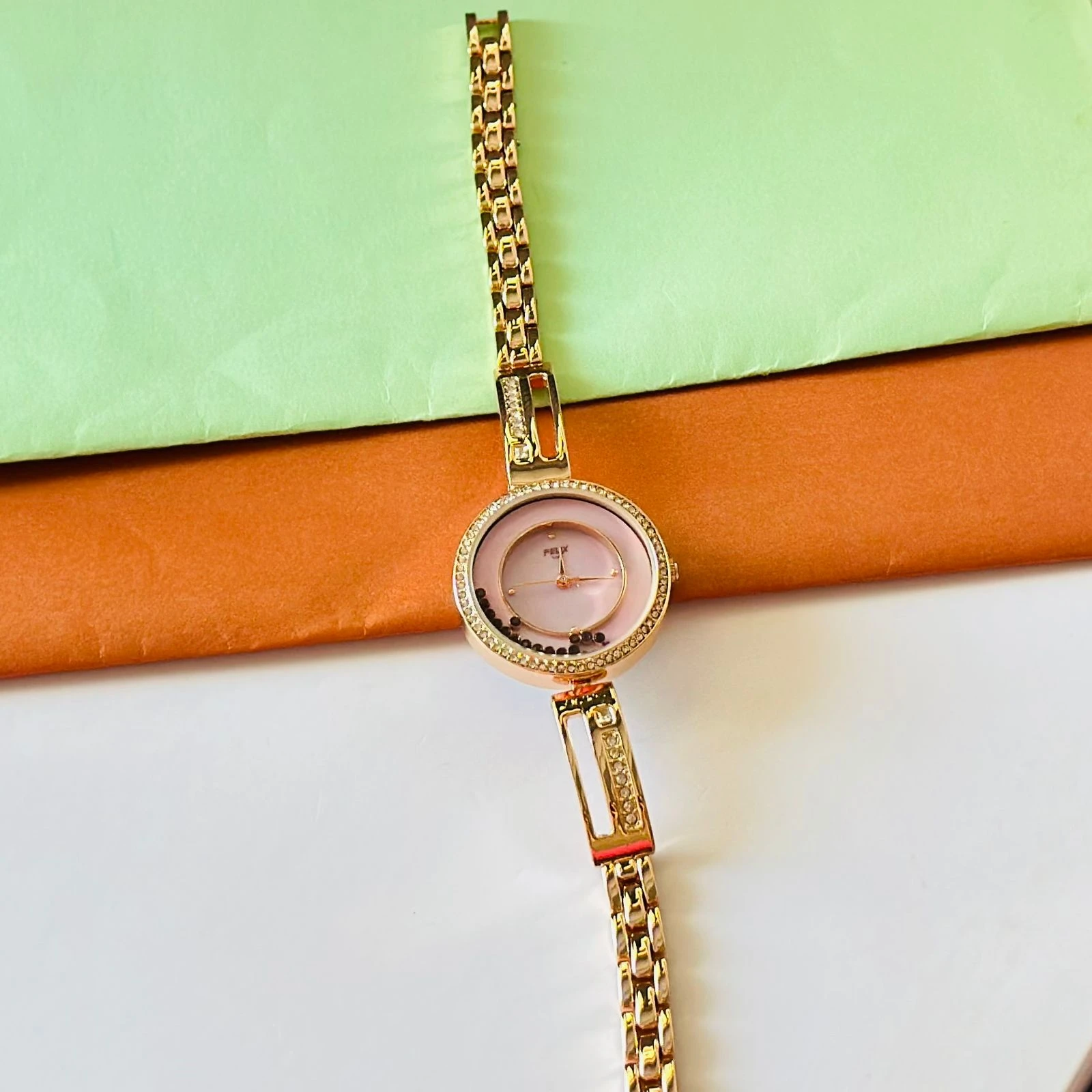 Raga Viva quartz analog watch for women with a rose gold metal strap