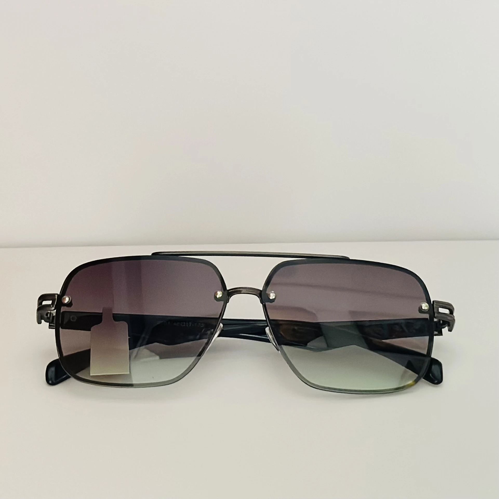 Ted Smith UV Protection Aviator sunglasses with a black metal frame and gradient lenses.
