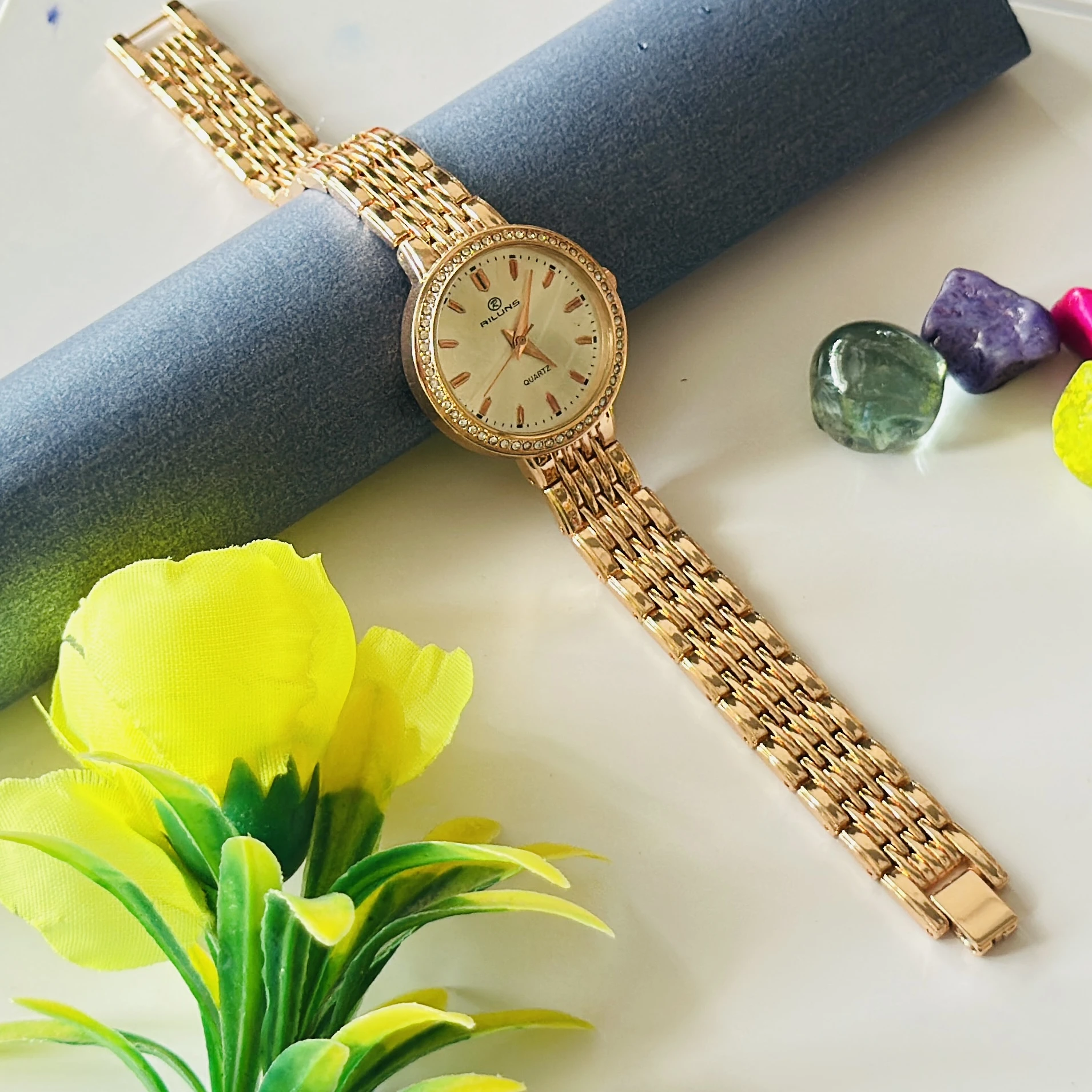 gold-toned Promise brand quartz women's watch