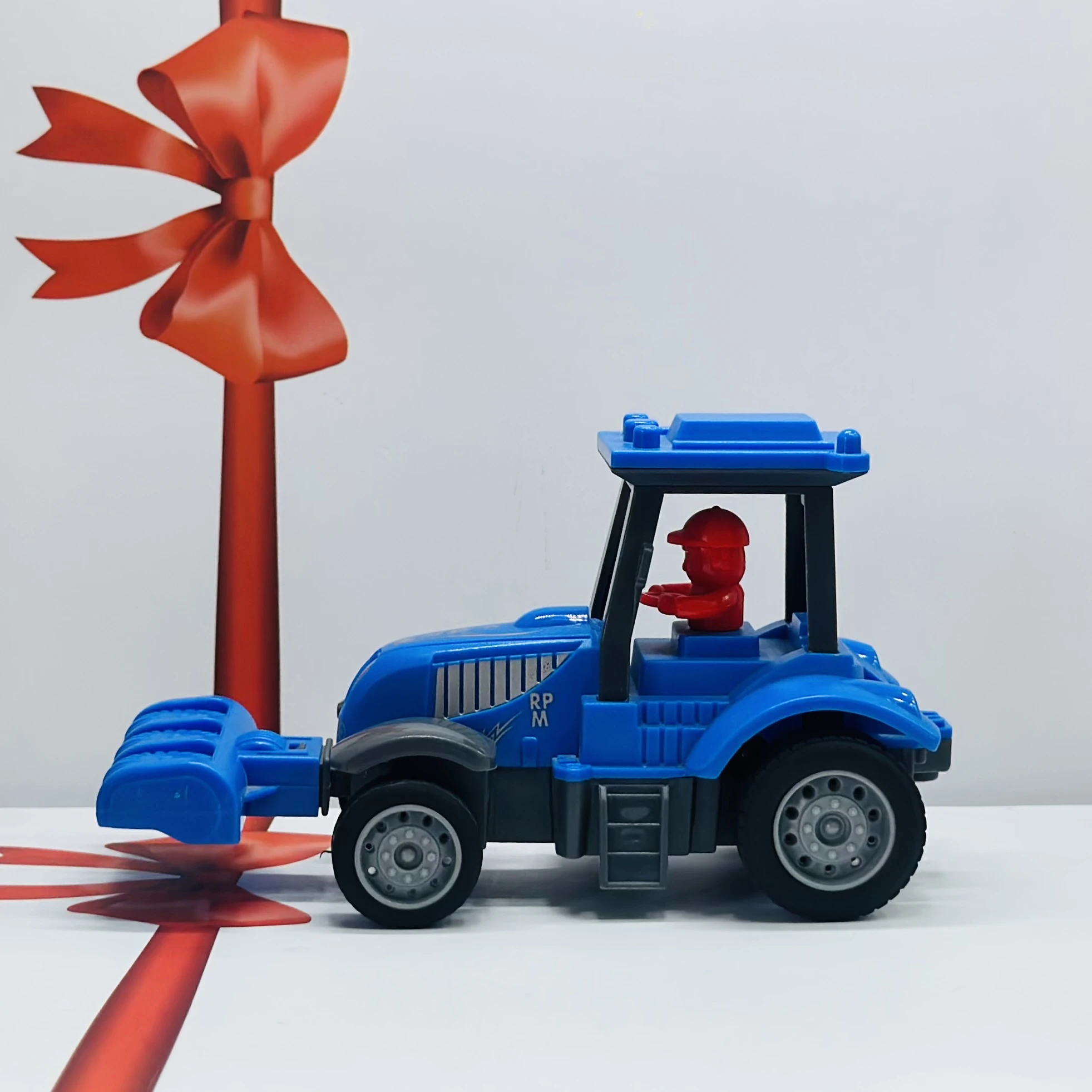 Blue plastic toy tractor