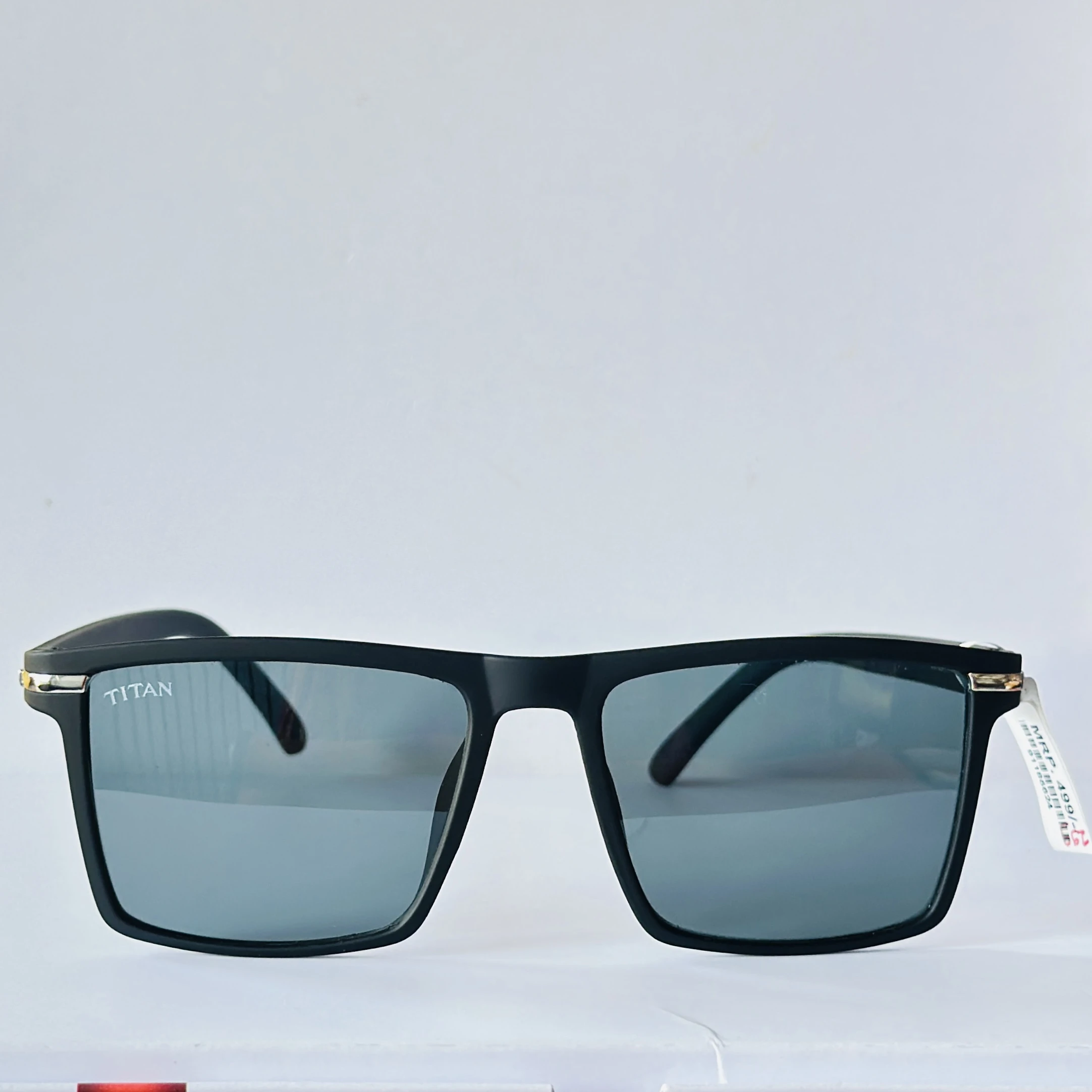 Black rectangular frame with blue-toned lenses.