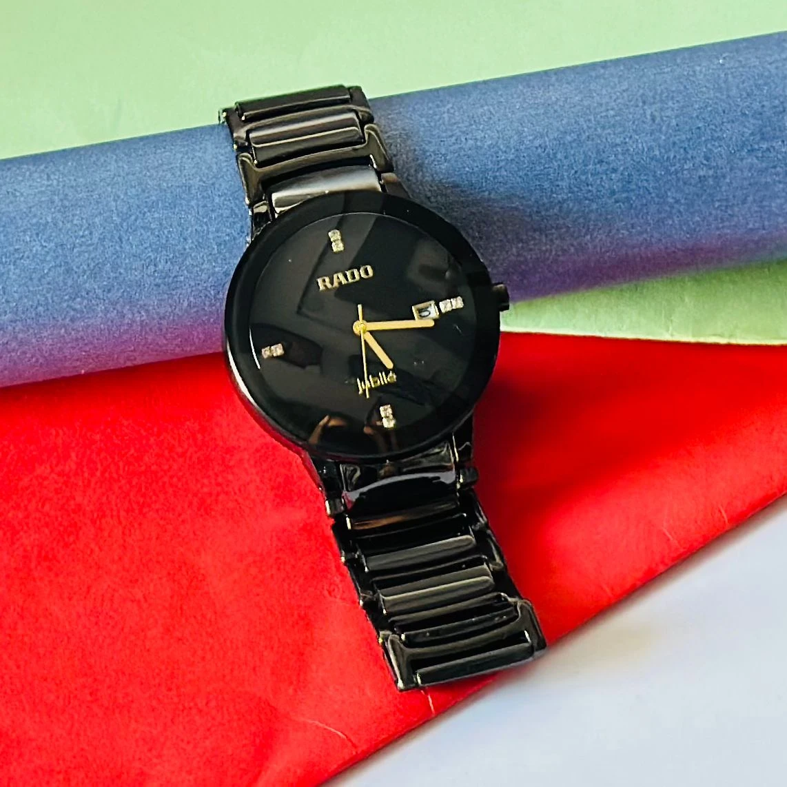 Rado Integral black ceramic and yellow gold-tone watch.