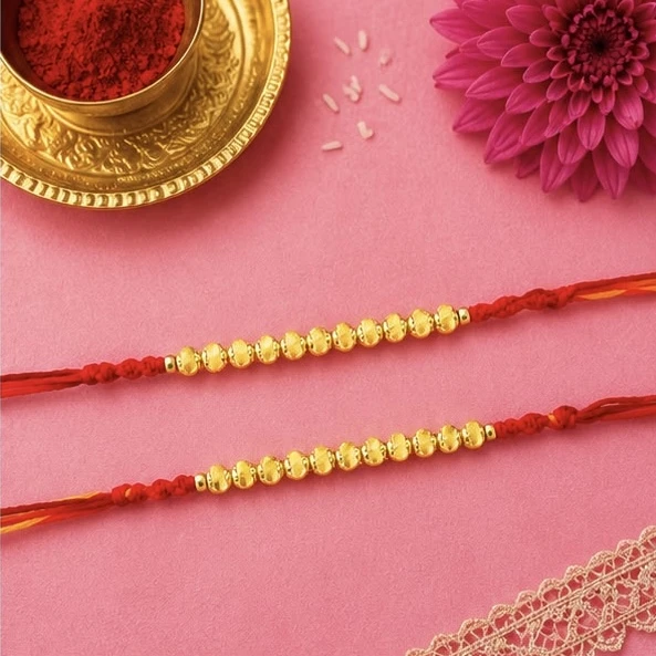 Vighnaharta Fashion Jewellery set featuring pearl and beaded tie-up rakhis.
