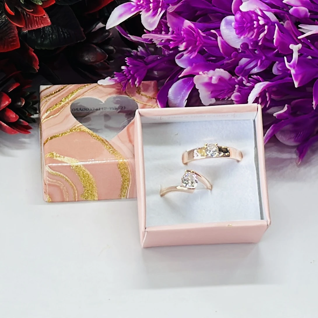 rose gold-plated cubic zirconia couple rings.