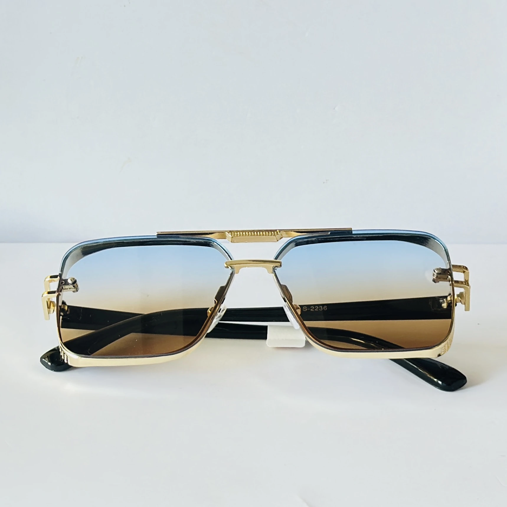 sunglasses feature a square frame