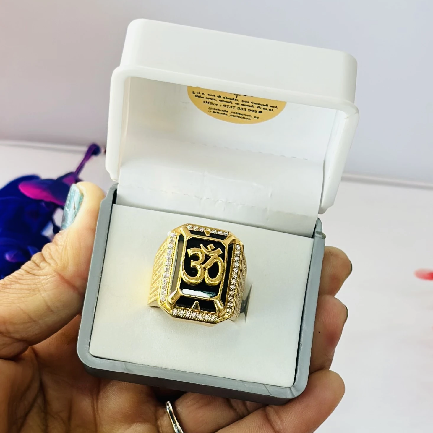 Gold plated brass men's ring featuring an 'Om' symbol