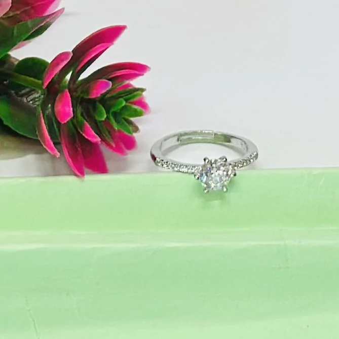 An adjustable silver-plated ring