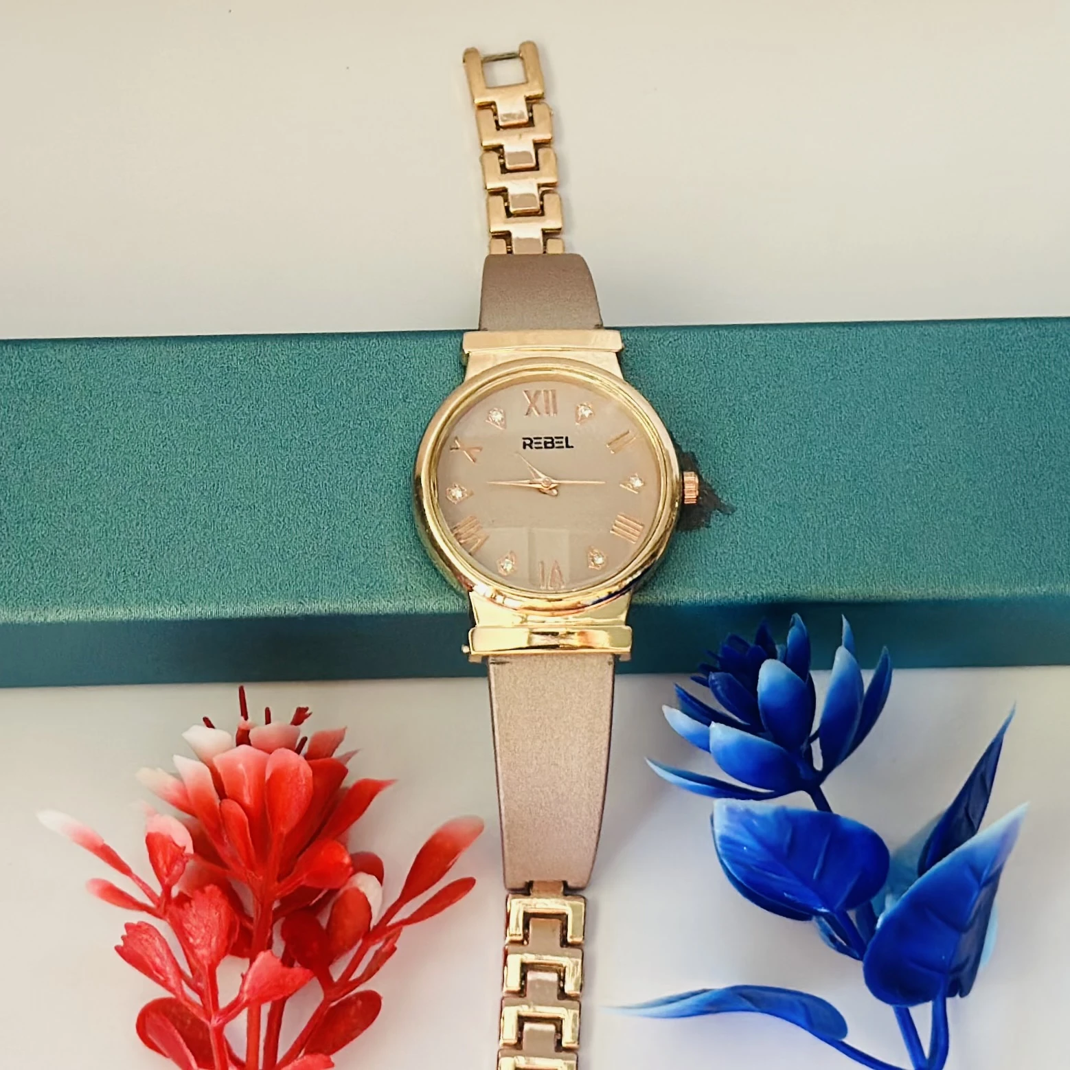 Rose gold analog watch