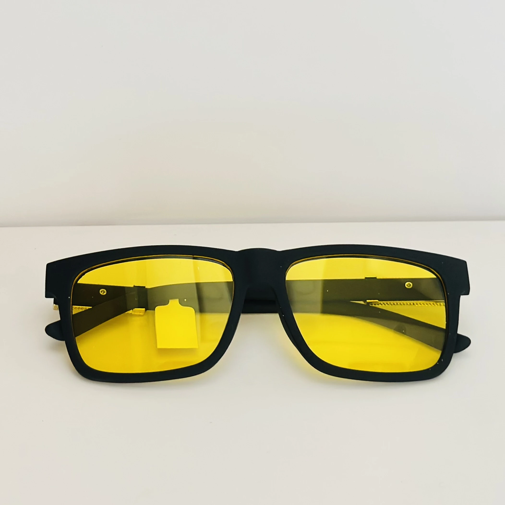 Burberry Knight BE4358 3001/85 square sunglasses in a black acetate frame with yellow lenses.