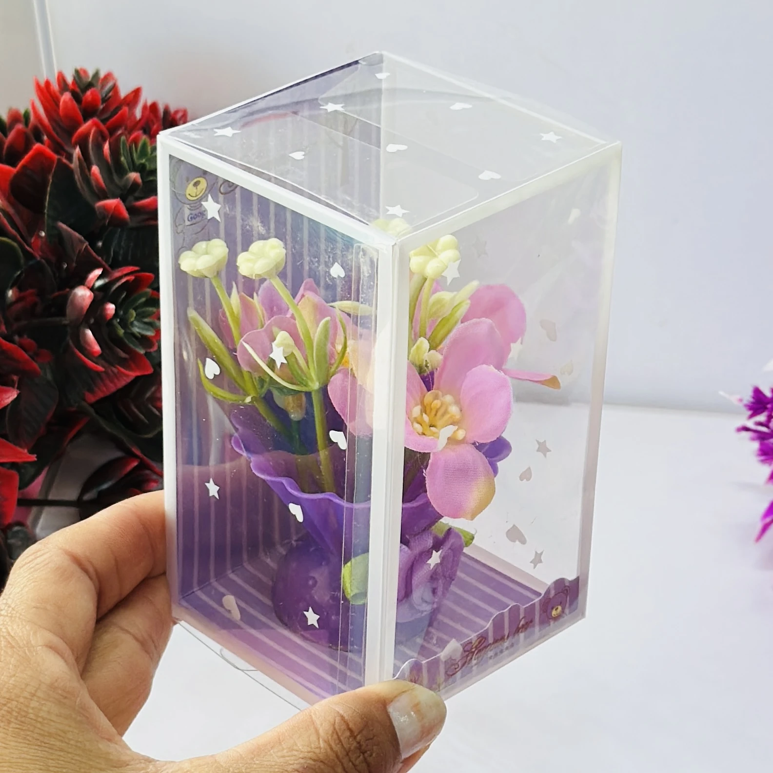 Tulip flower arrangement in a decorative gift box.
