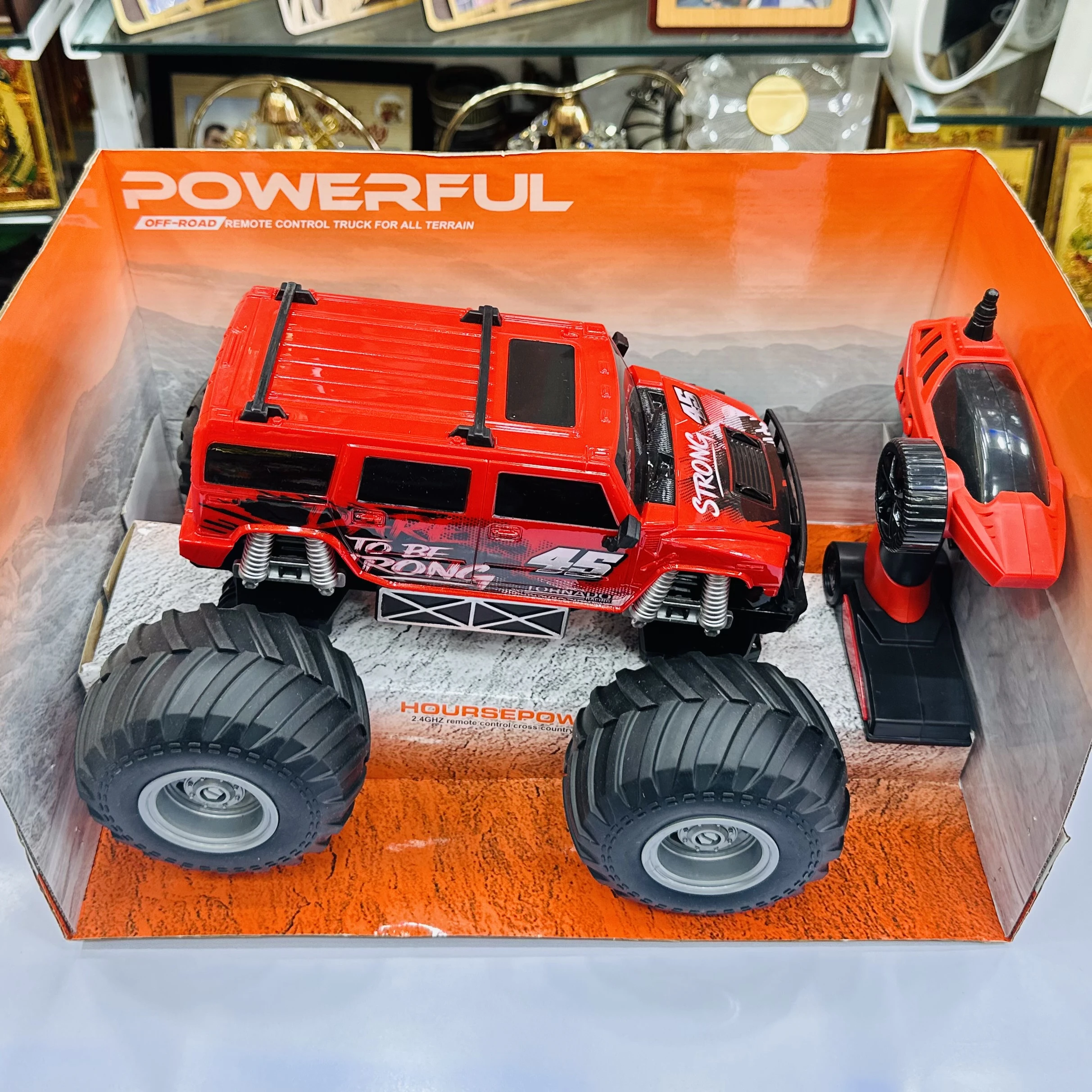 "Spray Climb" remote-control monster truck toy.