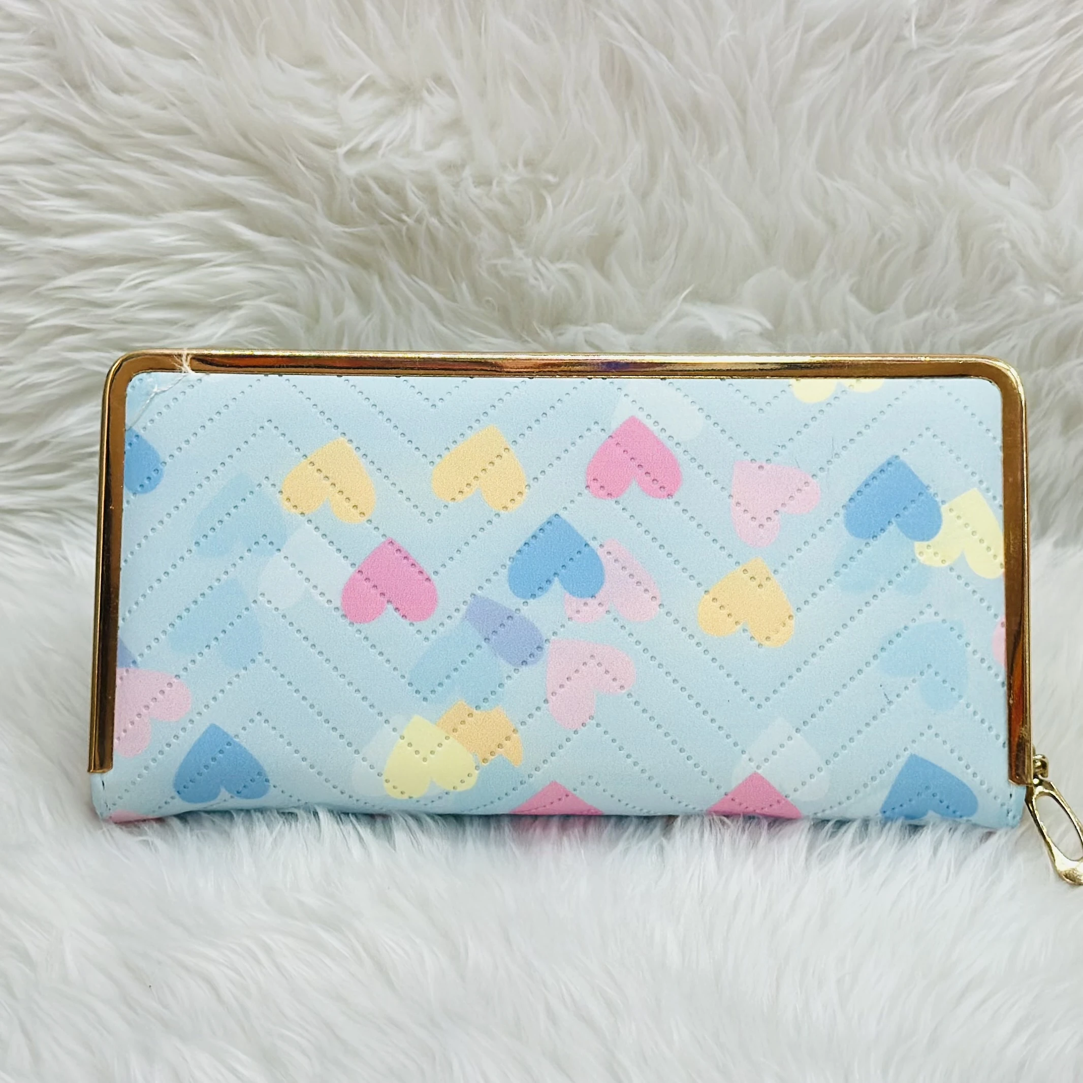 Kyraton women's long wallet with a light blue chevron and multi-colored heart pattern.