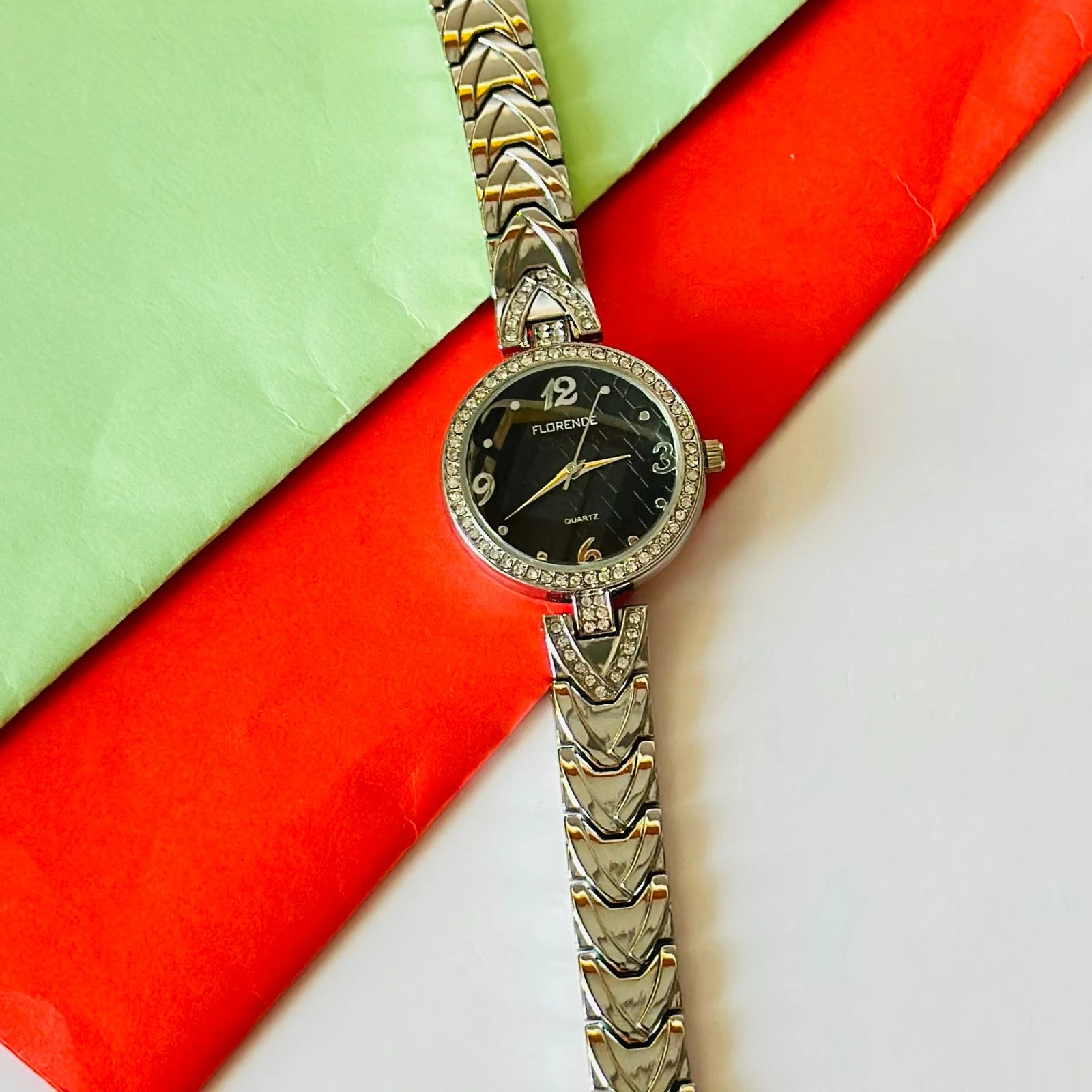 Florence quartz watch with a black dial and a two-tone stainless steel bracelet