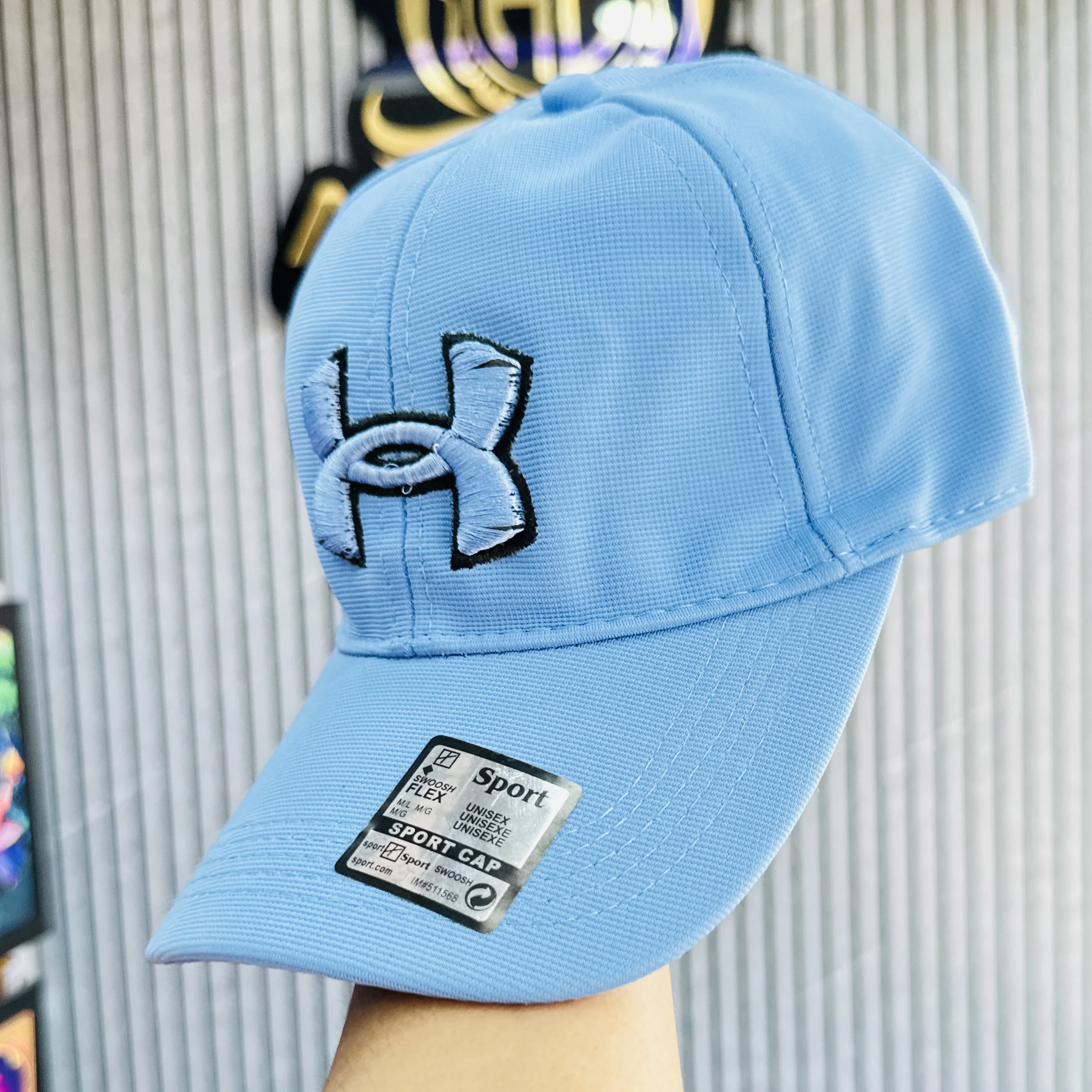 light blue Under Armour Golf96 baseball cap