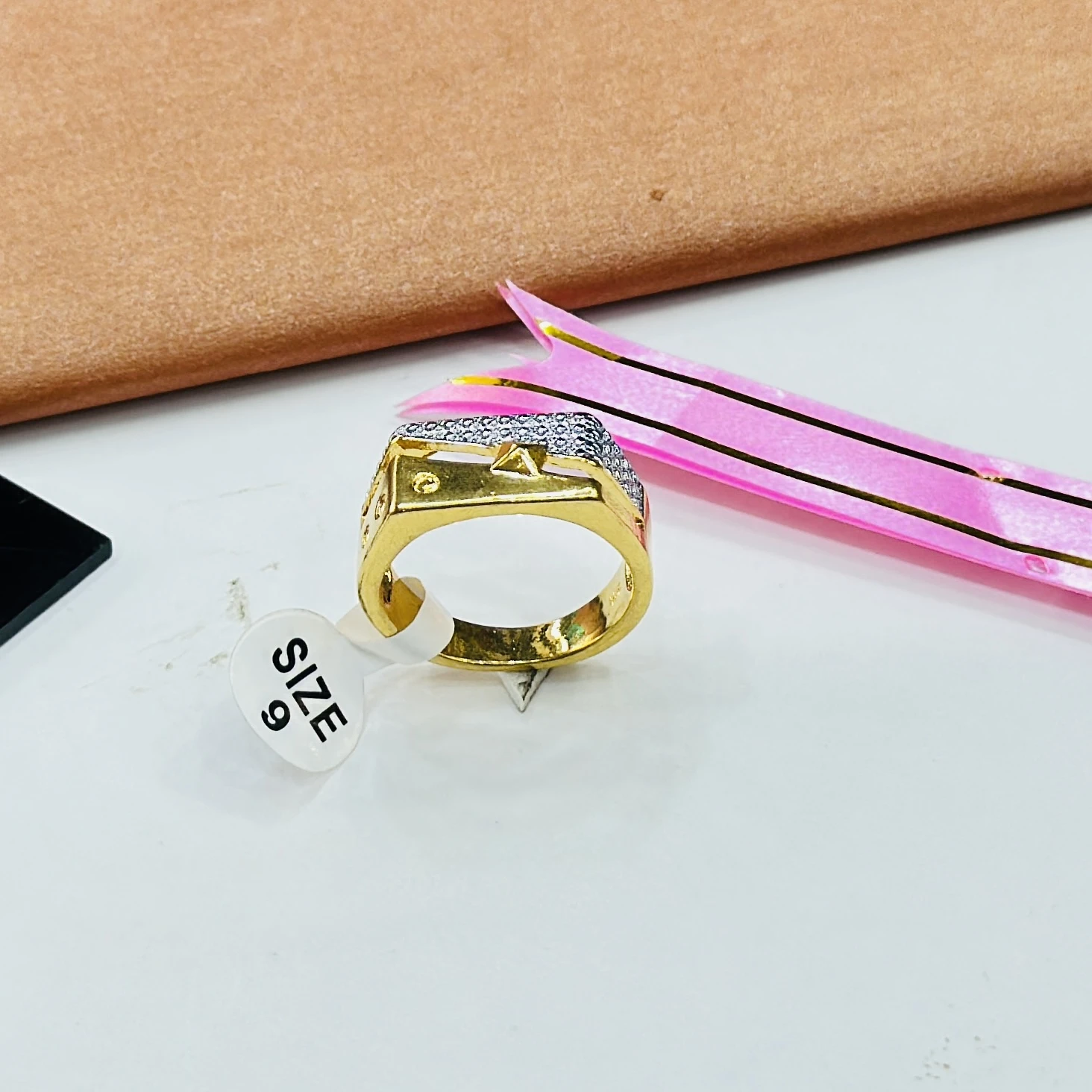 gents gold ring with American diamond embellishments