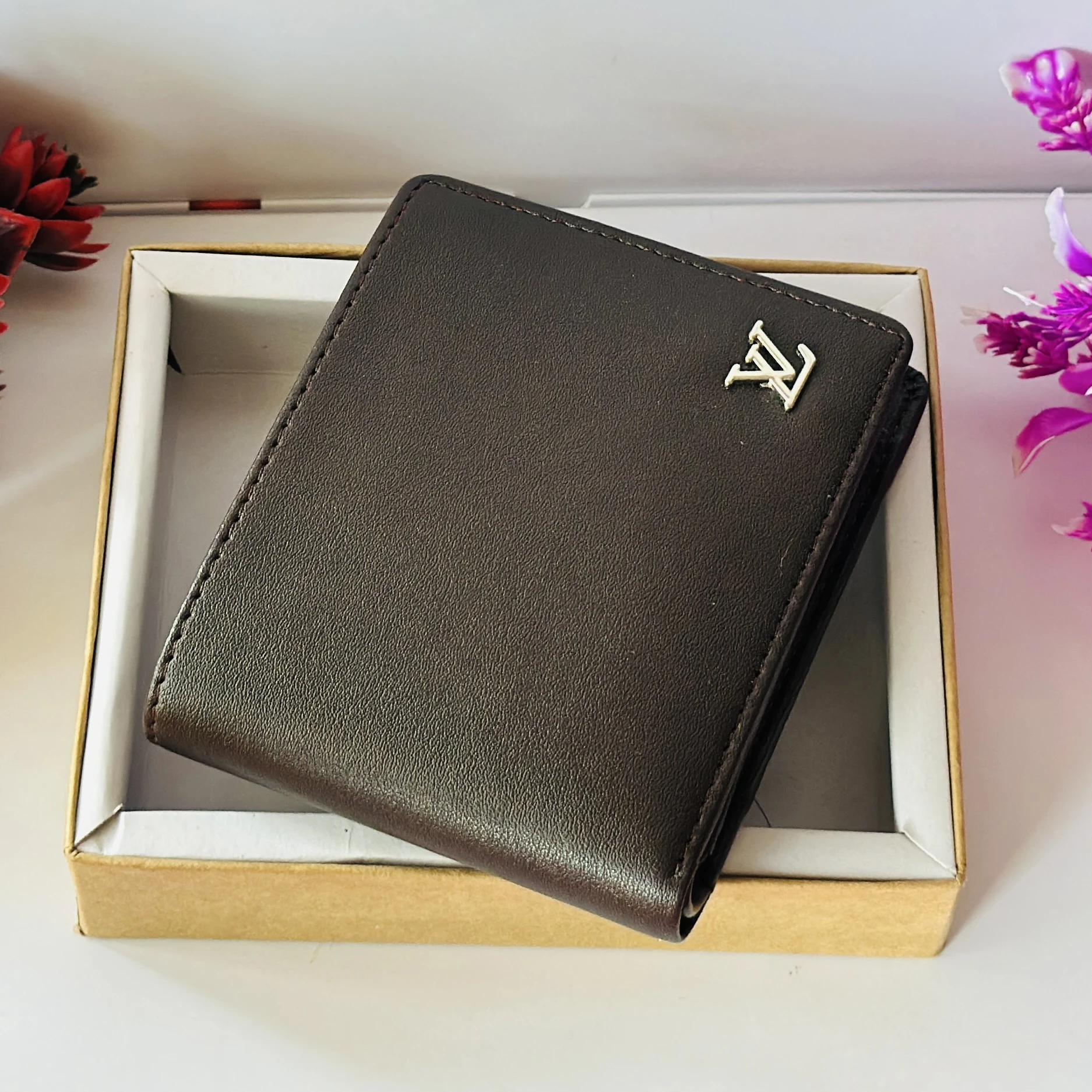 Louis Vuitton Multiple Wallet in black leather.