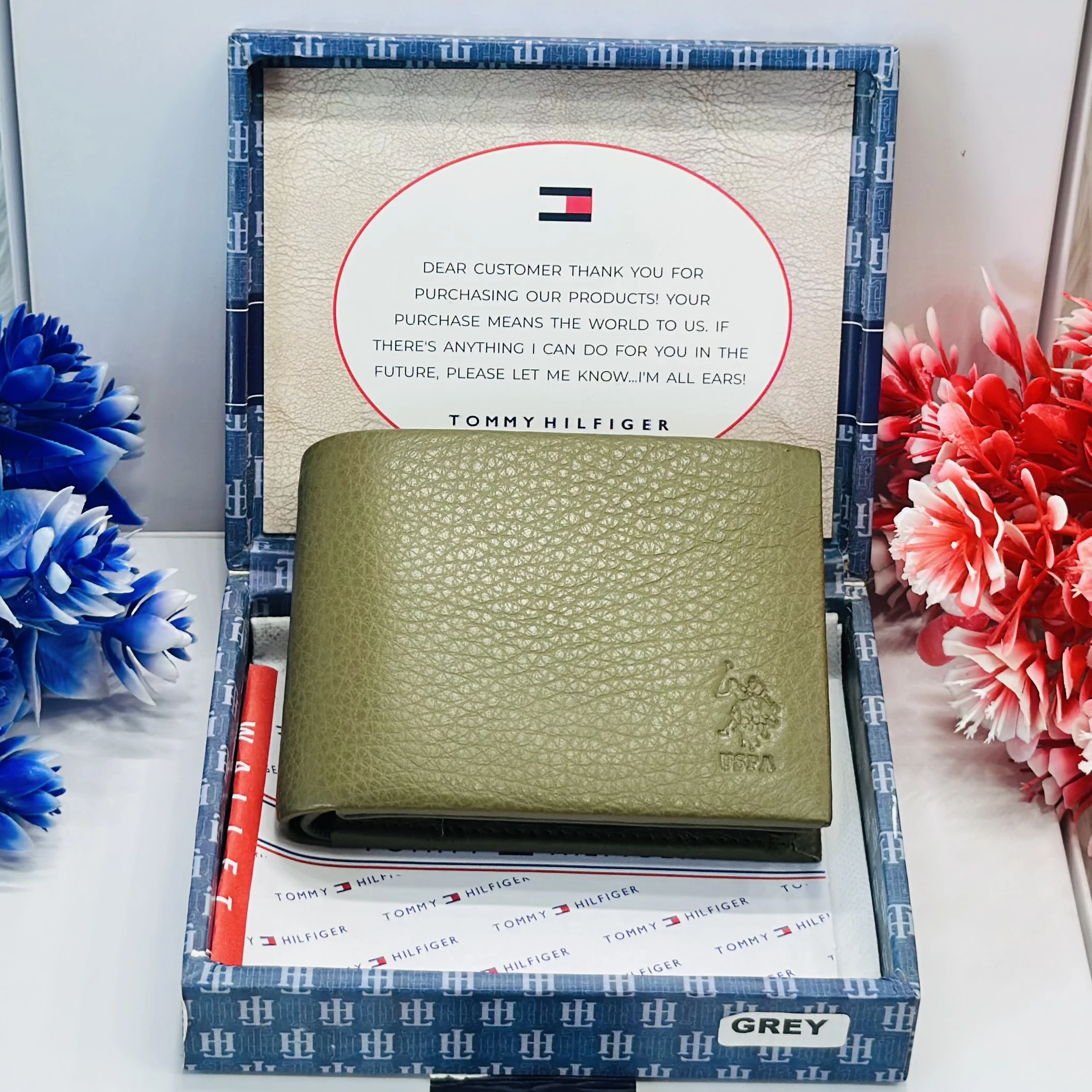 U.S. Polo Assn. bi-fold solid wallet in an olive color.