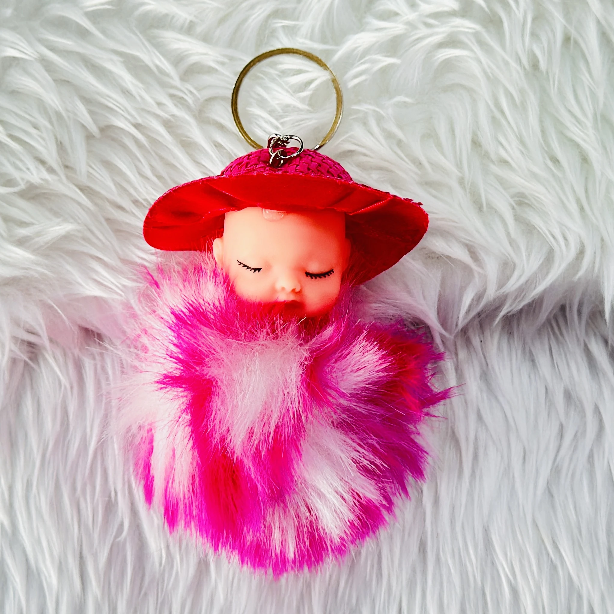 fluffy sleeping baby doll keychain