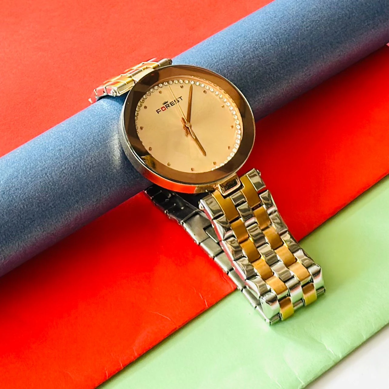 Forest women's watch with a round, gold-tone case