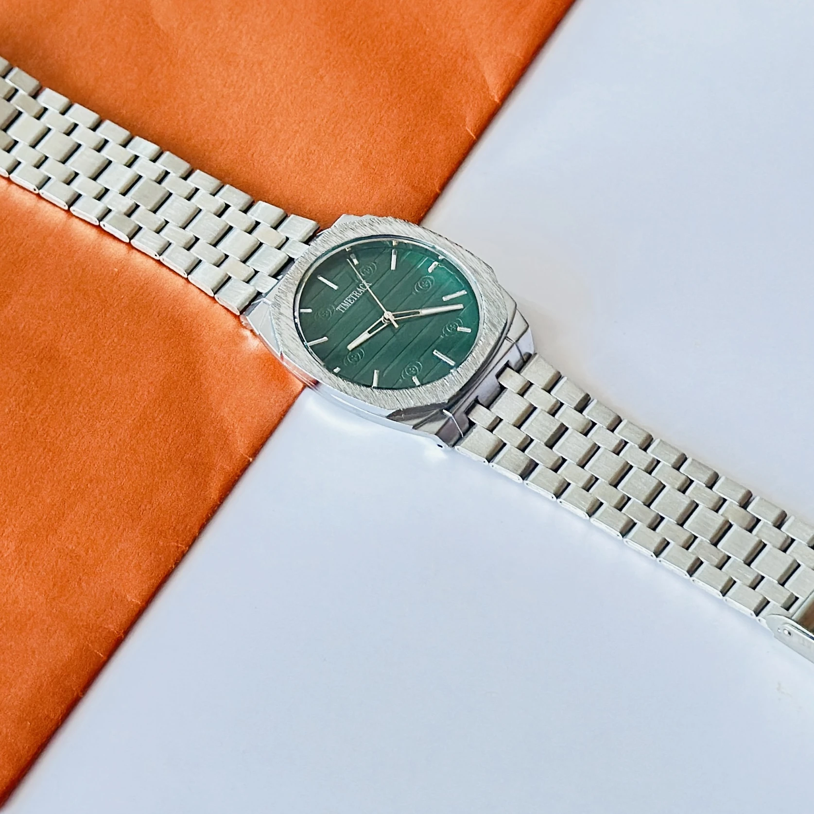 silver-toned stainless steel analogue watch