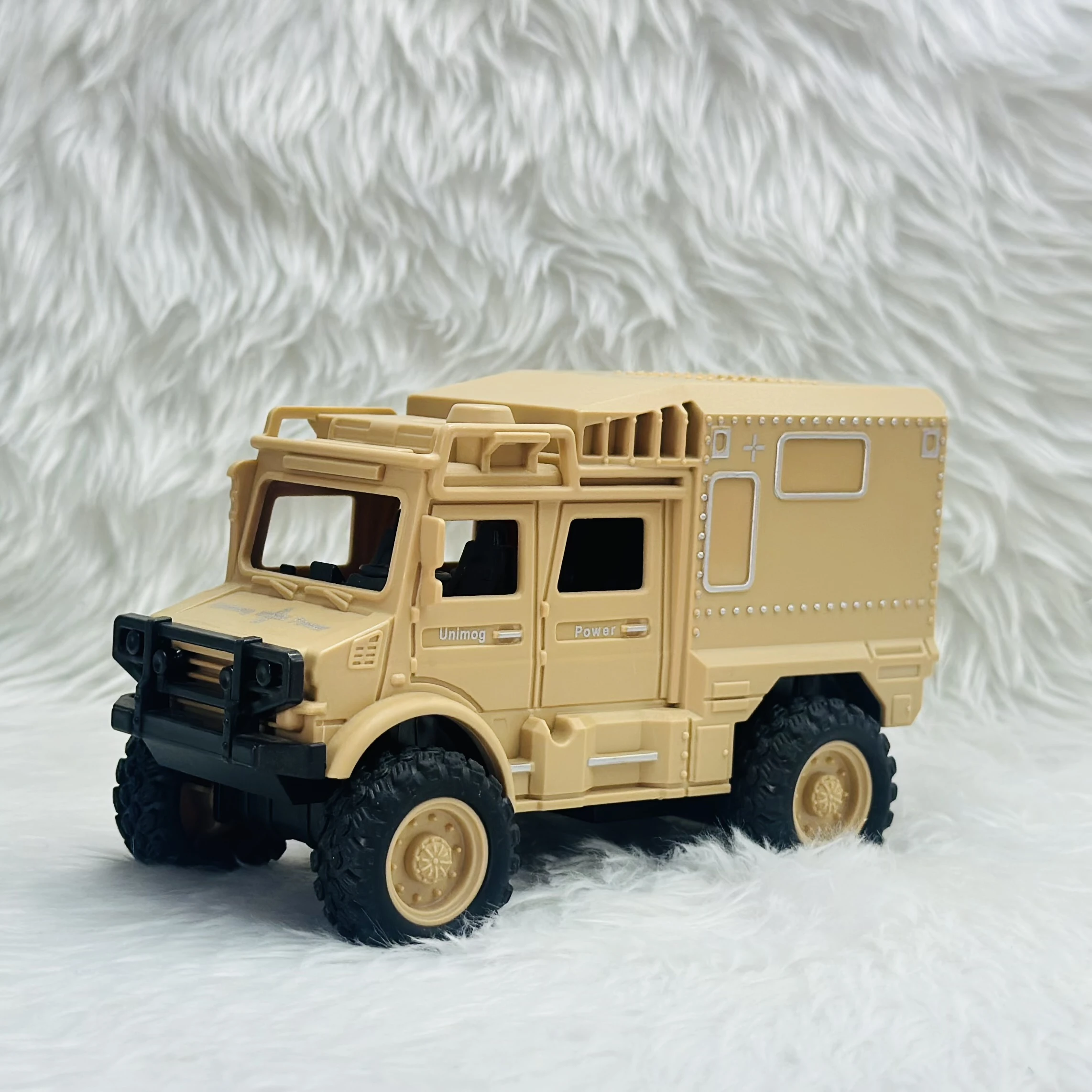 Toy Club Unimog army truck toy.