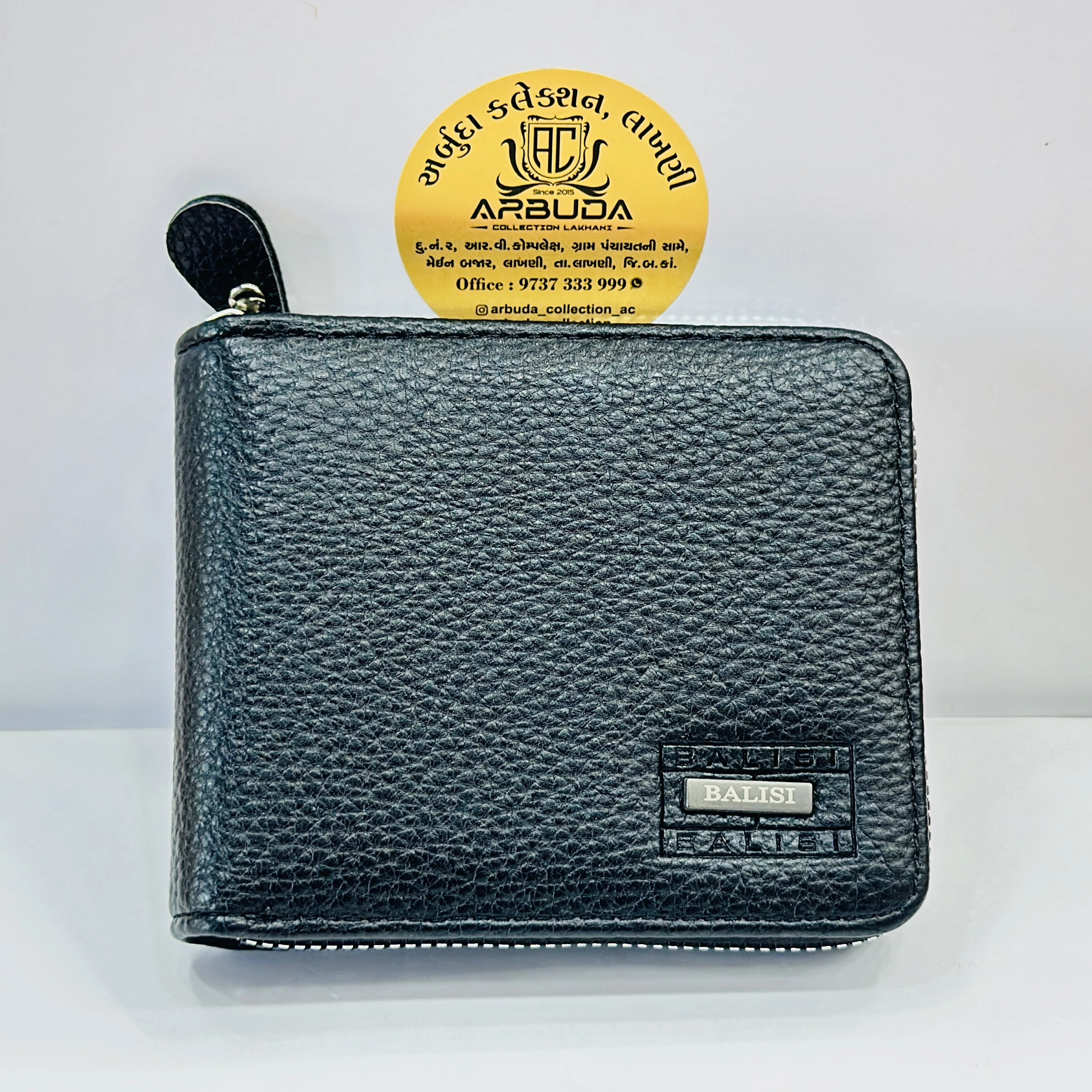 Black Balisi textured leather zip-around wallet for men.