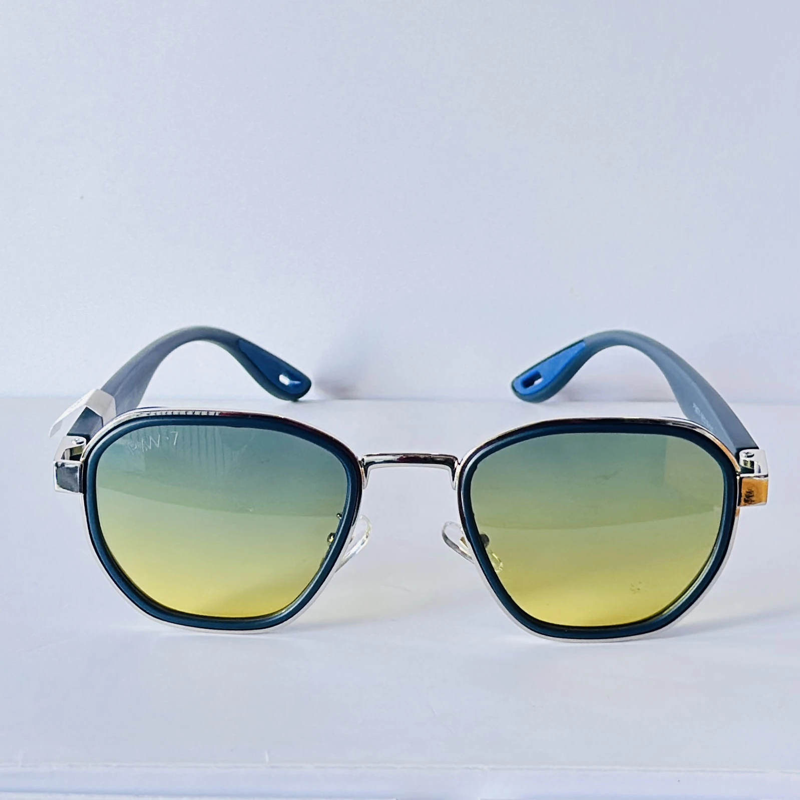 IDEE square sunglasses feature a silver frame
