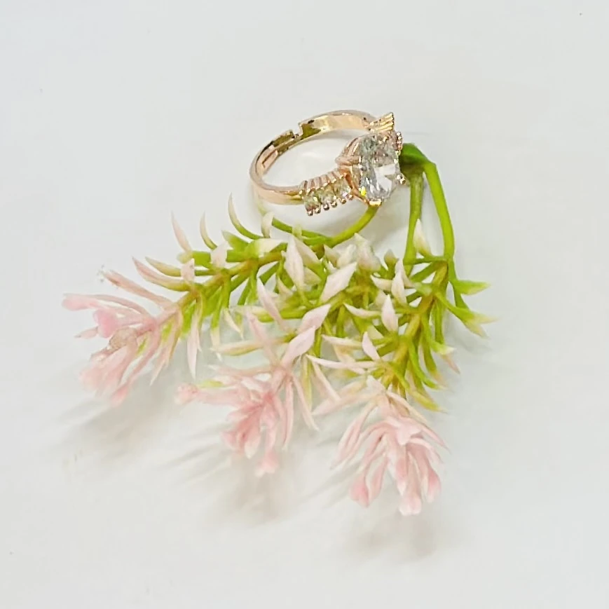 An adjustable art deco style ring