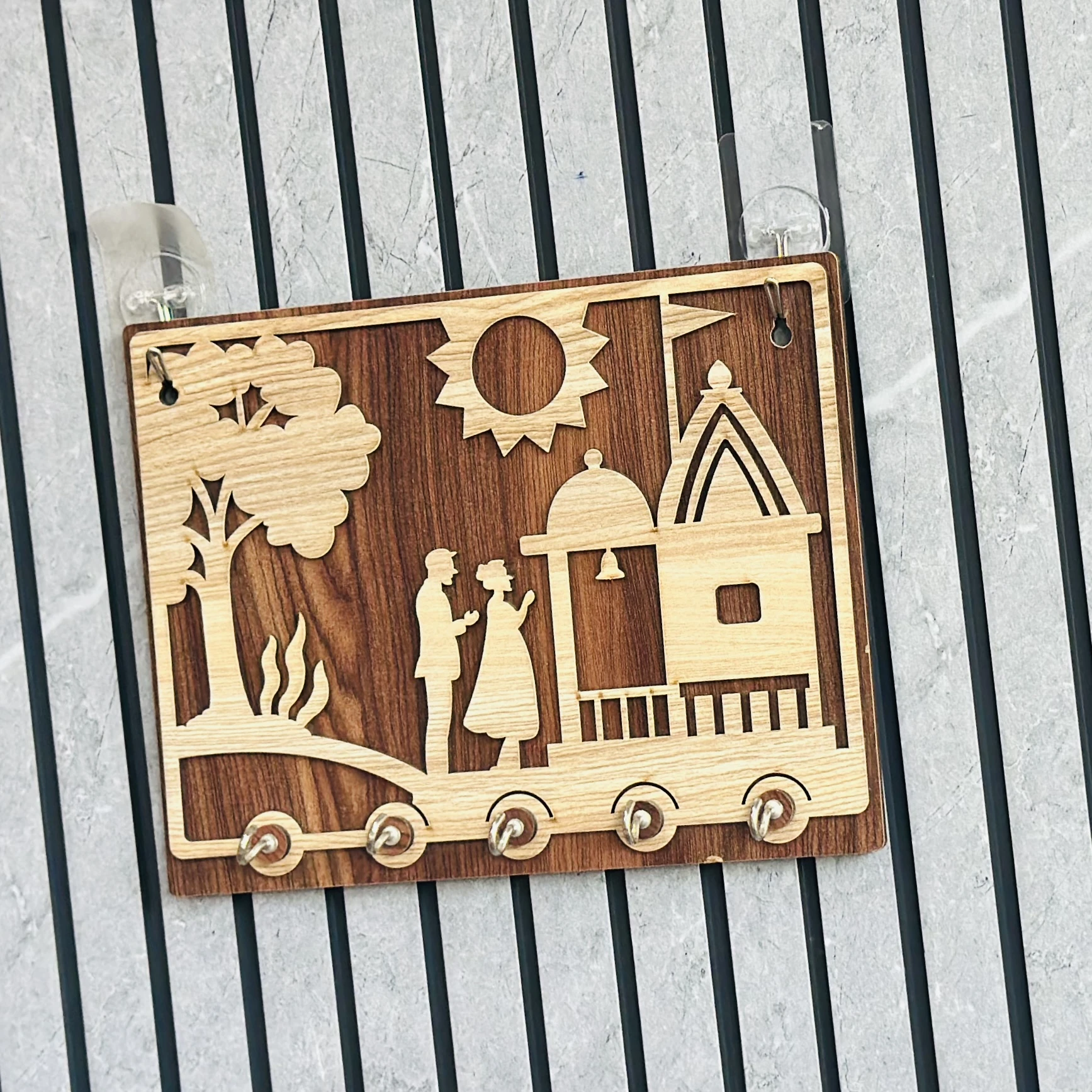 Wooden key holder with a decorative design(SKU-9XQ2BZ)