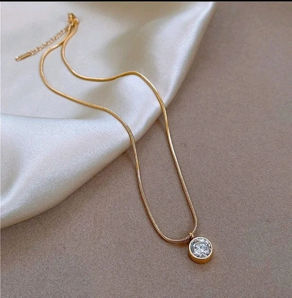 gold-plated necklace features a classic solitaire pendant with a snake chain.