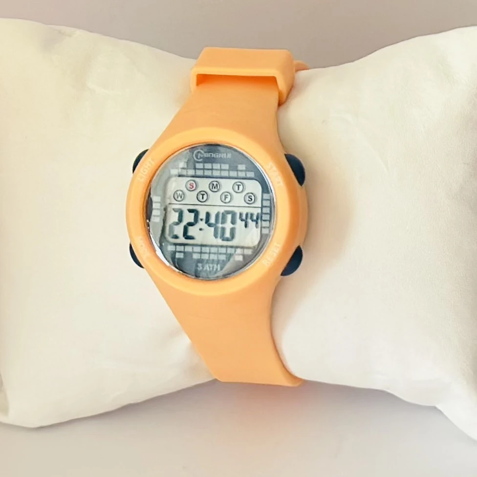 Mingrui digital multi-functional alarm watch with a silicone strap.