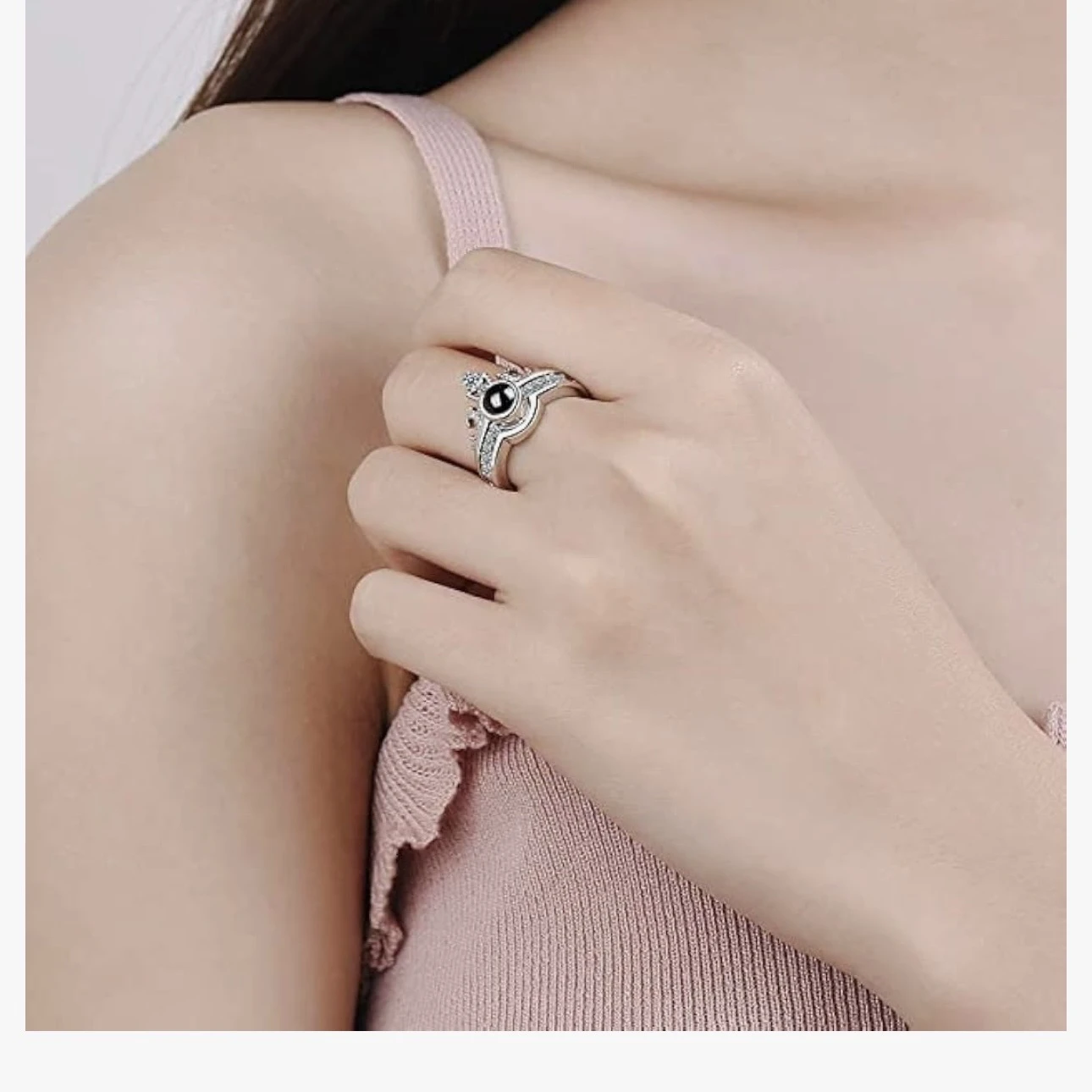 an adjustable silver-plated crown projection ring