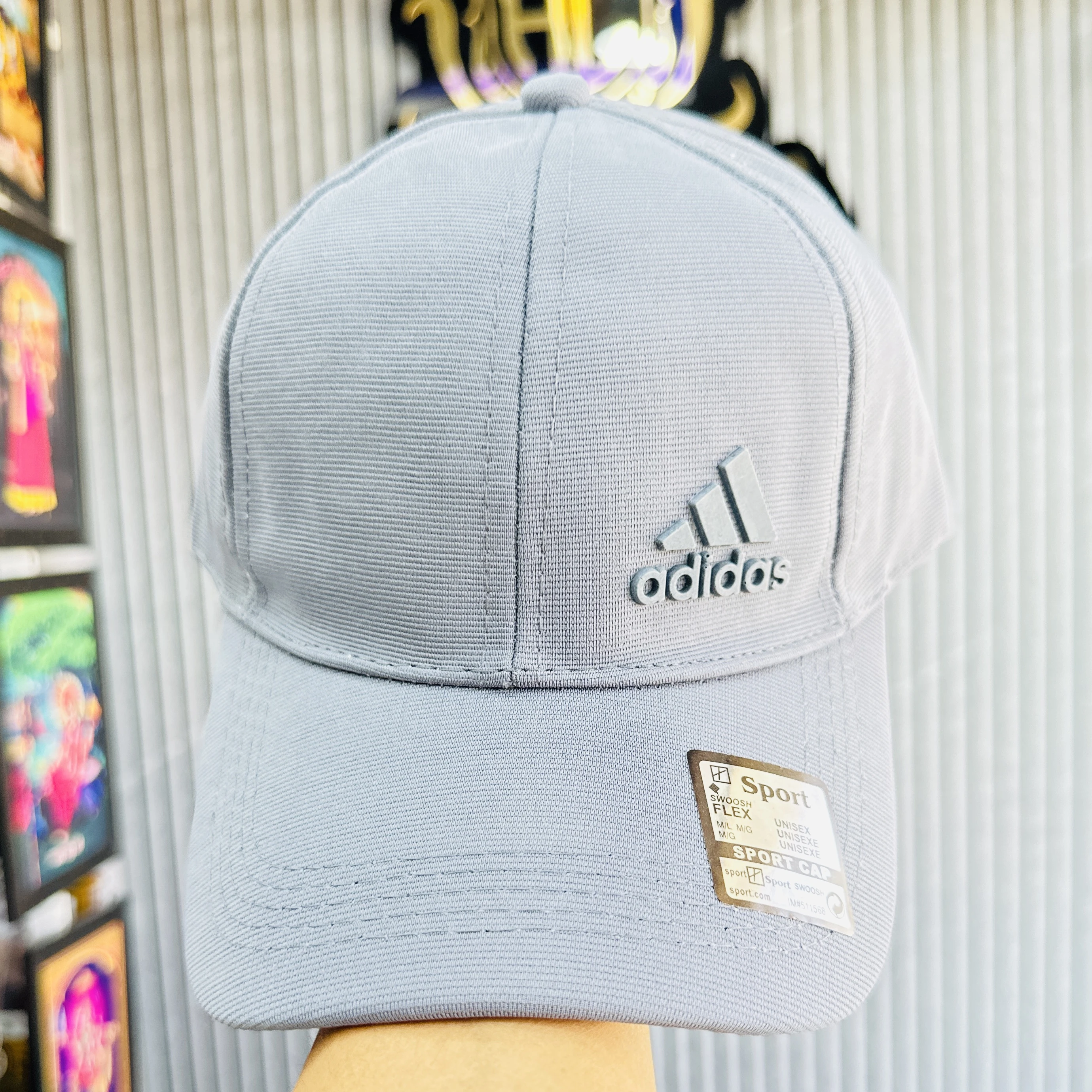 Adidas Men's Release Structured Stretch Fit Cap or similar model.