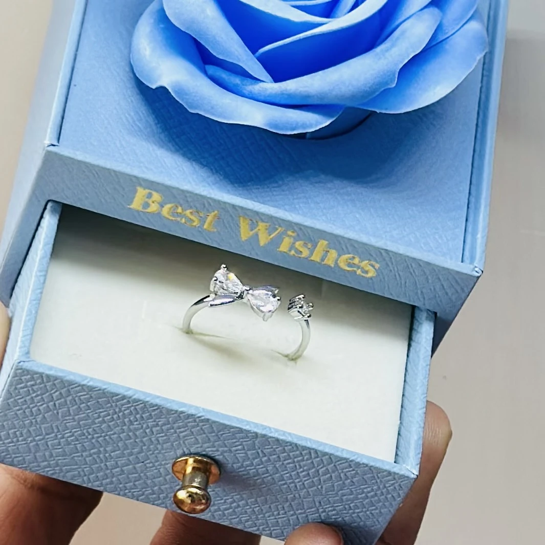 adjustable sterling silver double butterfly open ring with cubic zirconia stones.