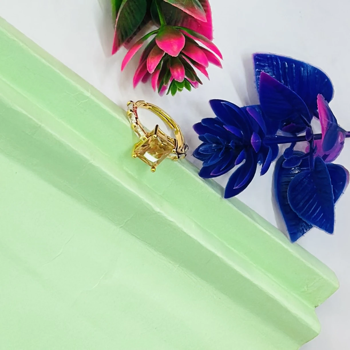 Gold plated ring with a yellow gemstone