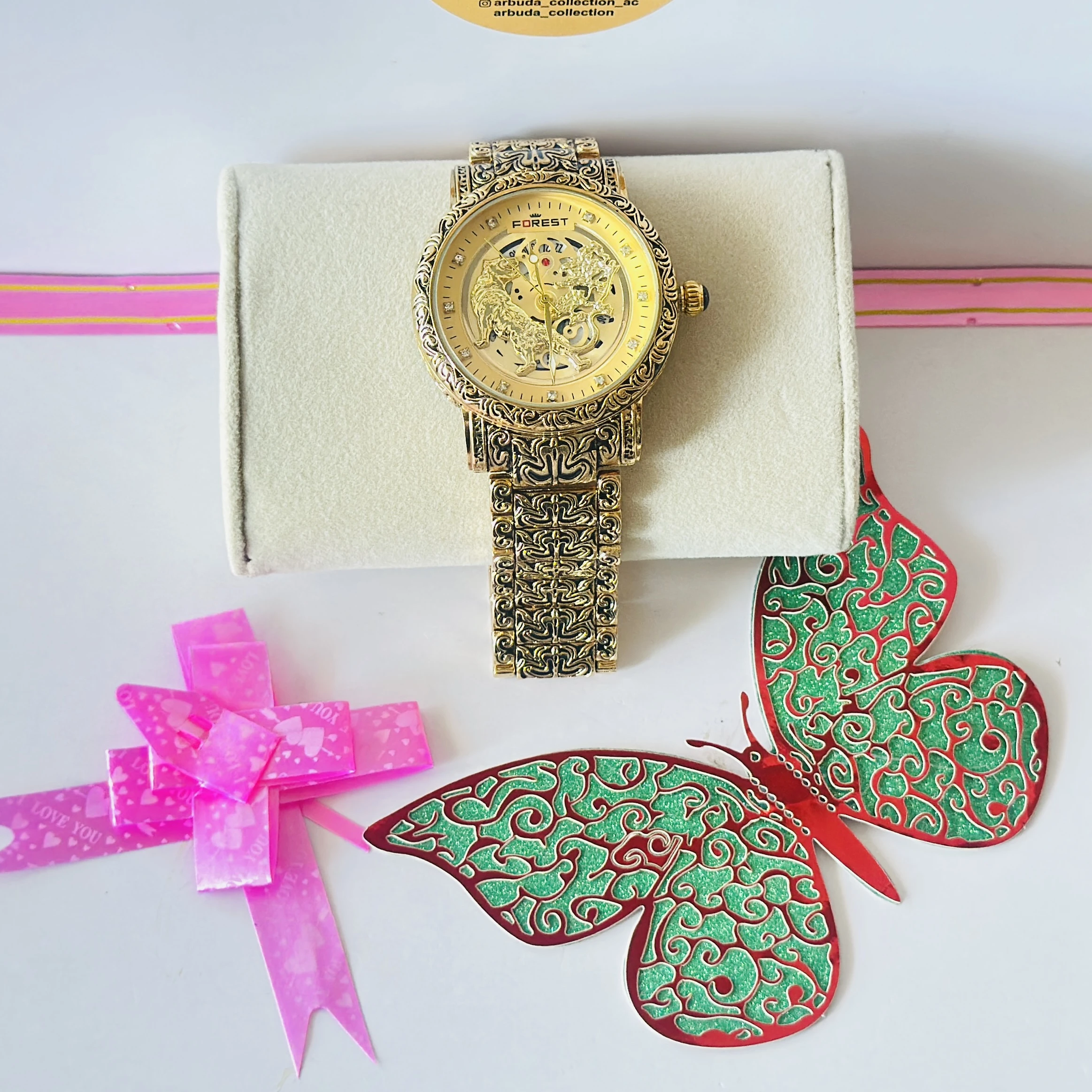 Forest Luxury Gold-Tone Tiger Skeleton Dial Watch with an engraved pattern band.
