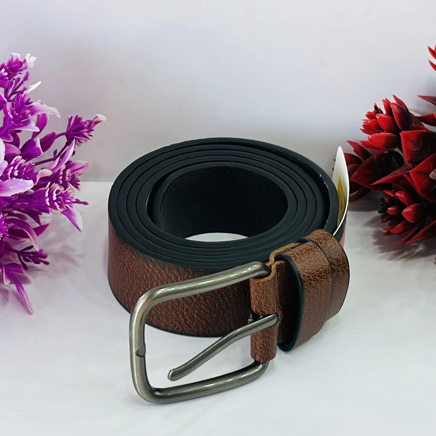 Brown textured leather or leatherette belt