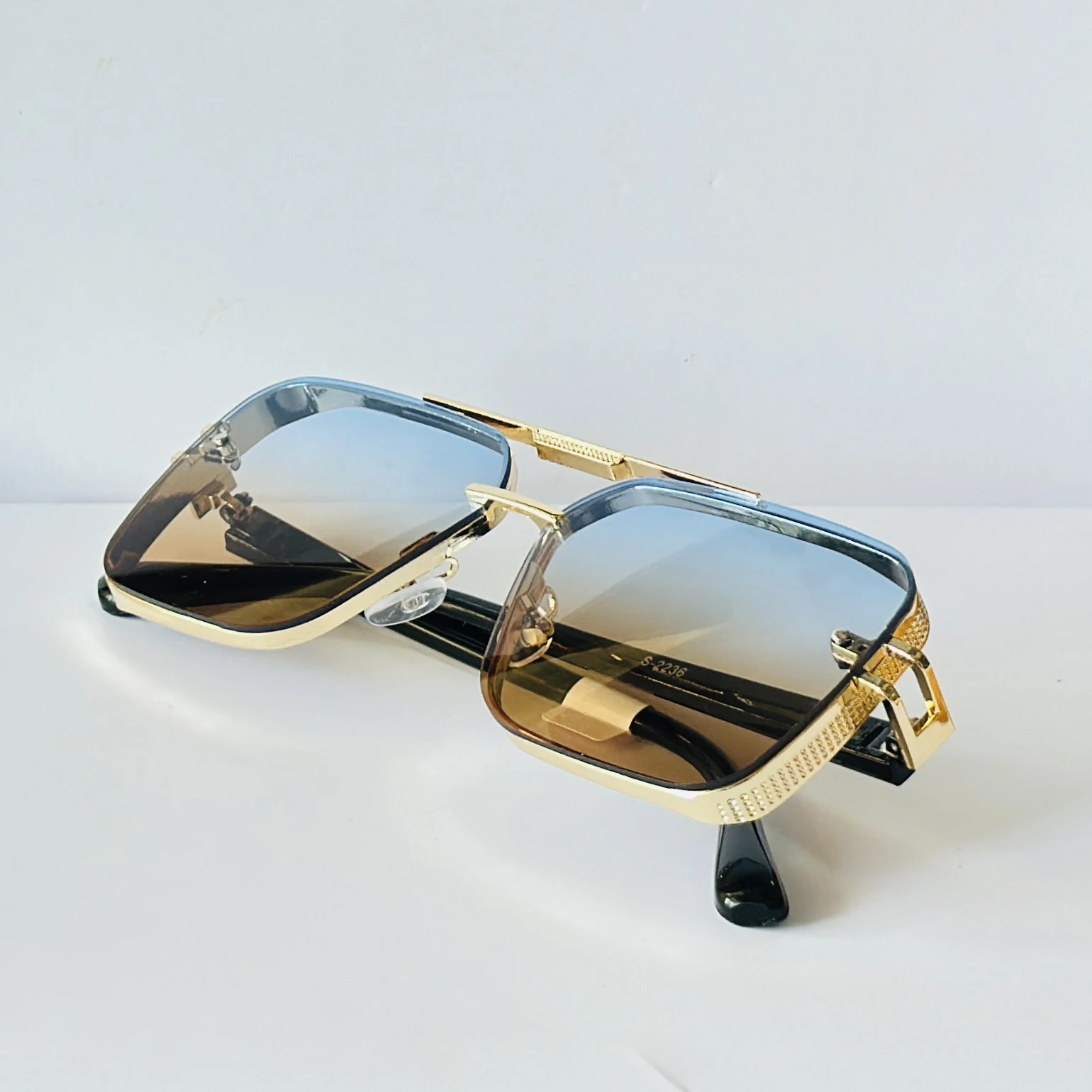 sunglasses feature a square frame