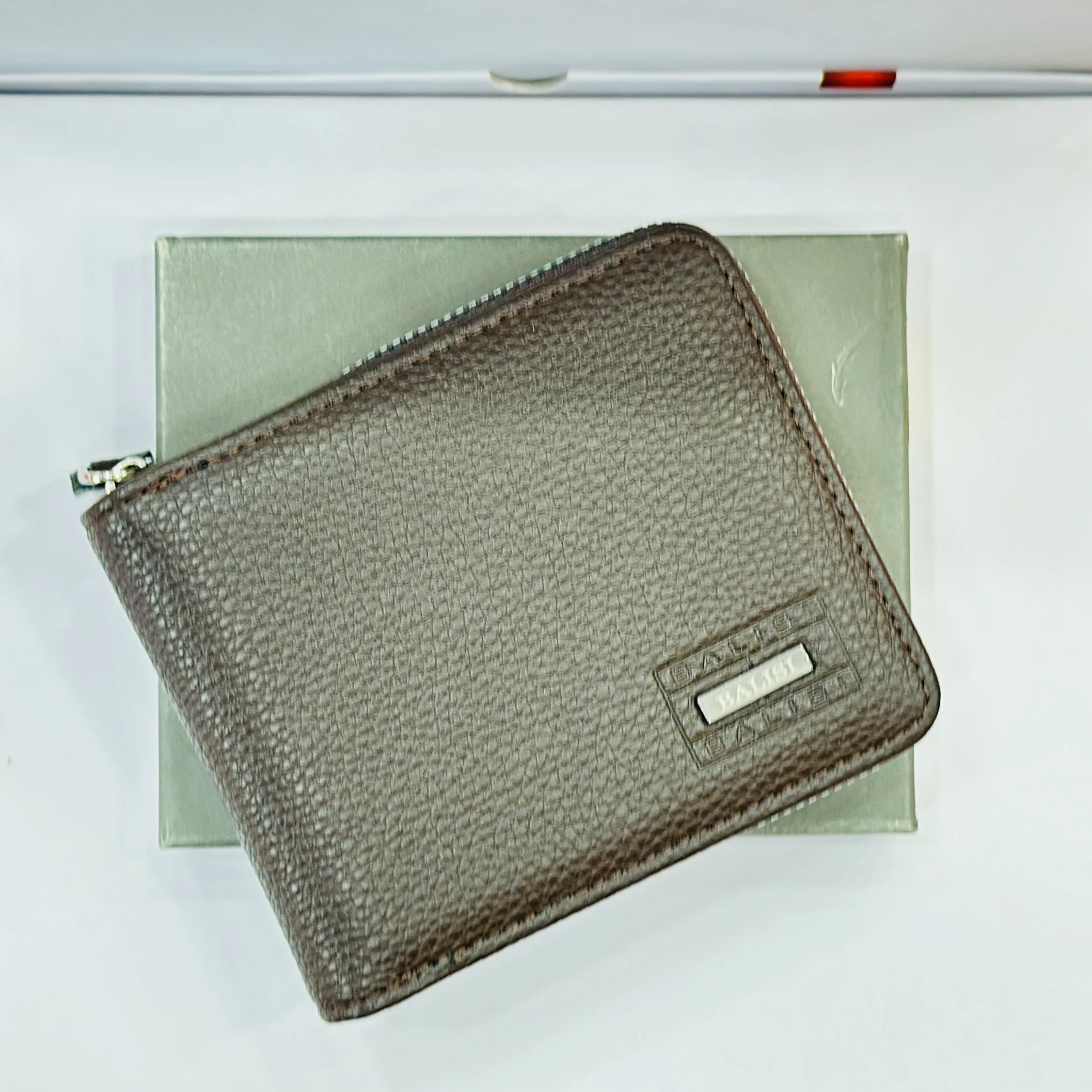 Brown leather zippered wallet
